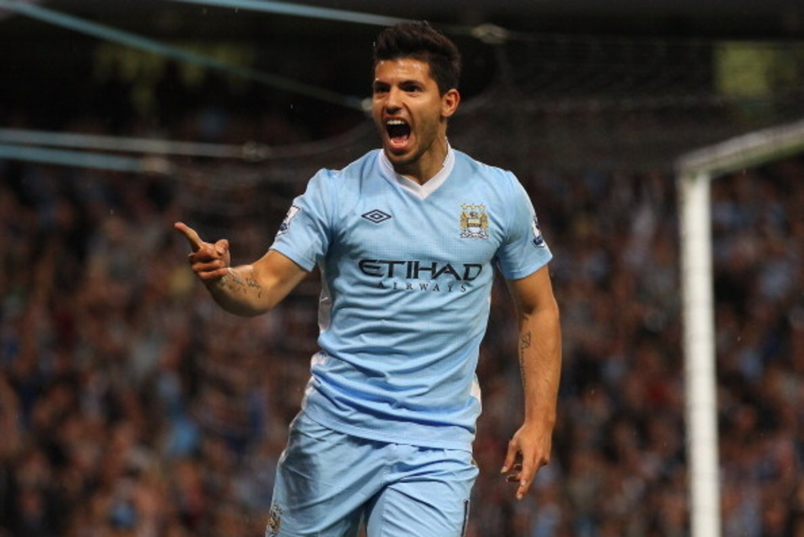 MANCHESTER, ENGLAND - AUGUST 15:  Sergio Aguero of Manchester City celebrates after scoring the second goal during the Barclays Premier League match between Manchester City and Swansea City at Etihad Stadium on August 15, 2011 in Manchester, England.  (Ph
