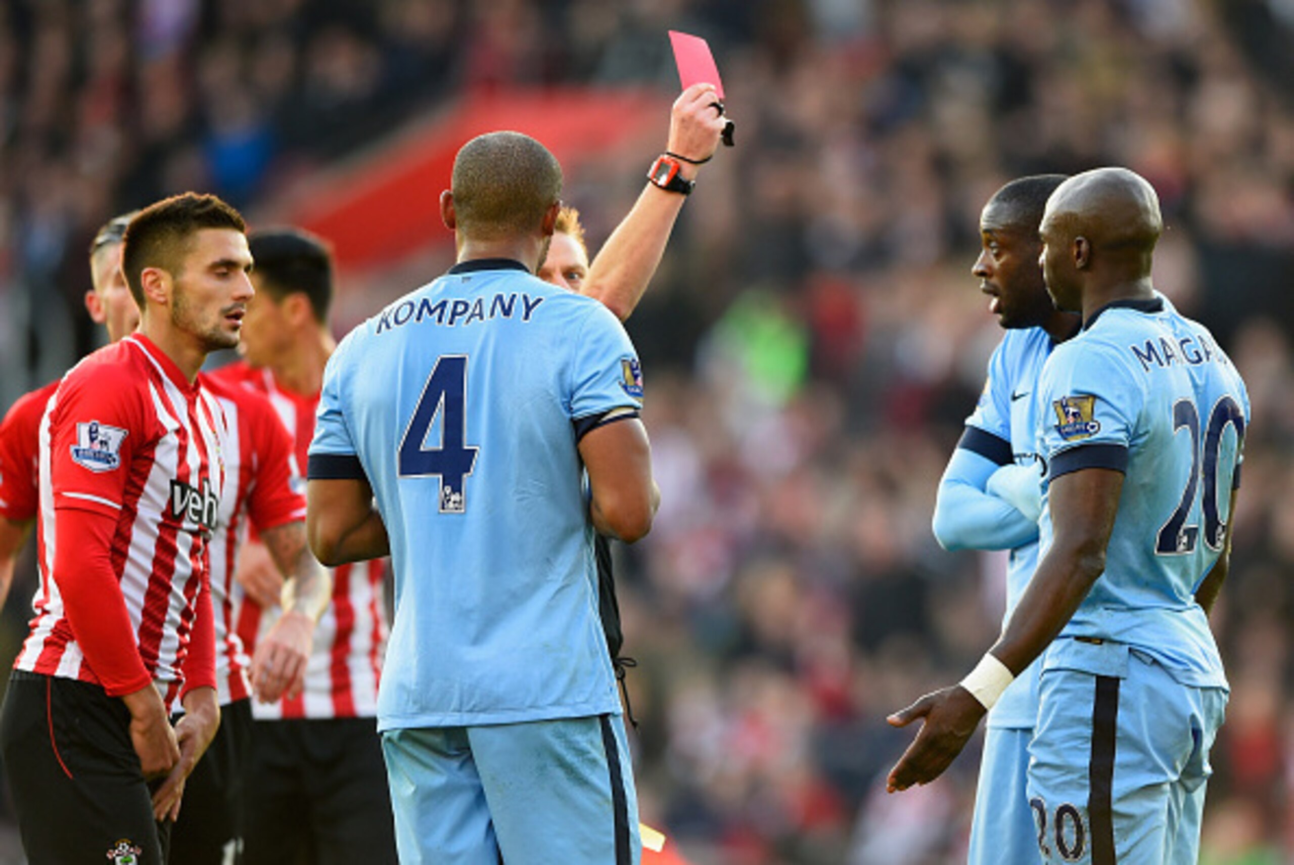 SOUTHAMPTON, ENGLAND - NOVEMBER 30:  Eliaquim Mangala of Manchester City (20) is shown a red card by referee Mike Jones and is sent off during the Barclays Premier League match between Southampton and Manchester City at St Mary's Stadium on November 30, 2
