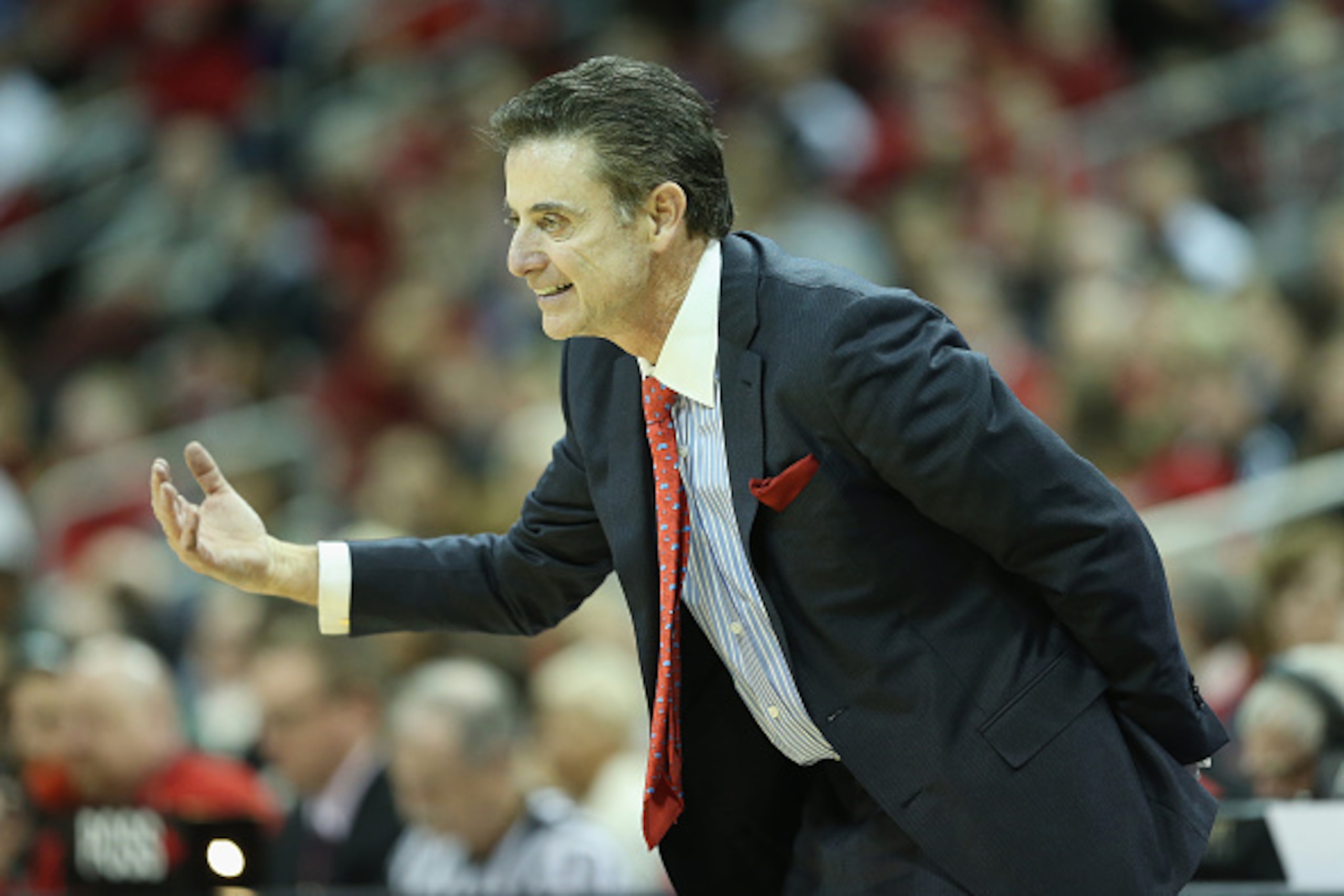 LOUISVILLE, KY - NOVEMBER 26:  Rick Pitino the head coach of the Louisville Cardinals gives instructions to his team during the game against the Cleveland State Vikings at KFC YUM! Center on November 26, 2014 in Louisville, Kentucky.  With tonights 45-33 