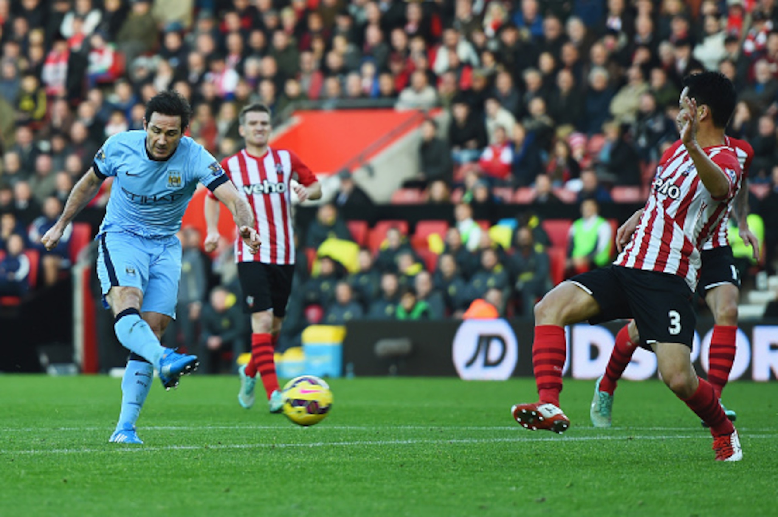 SOUTHAMPTON, ENGLAND - NOVEMBER 30:  Frank Lampard of Manchester City shoots past Maya Yoshida of Southampton to score their second goal during the Barclays Premier League match between Southampton and Manchester City at St Mary's Stadium on November 30, 
