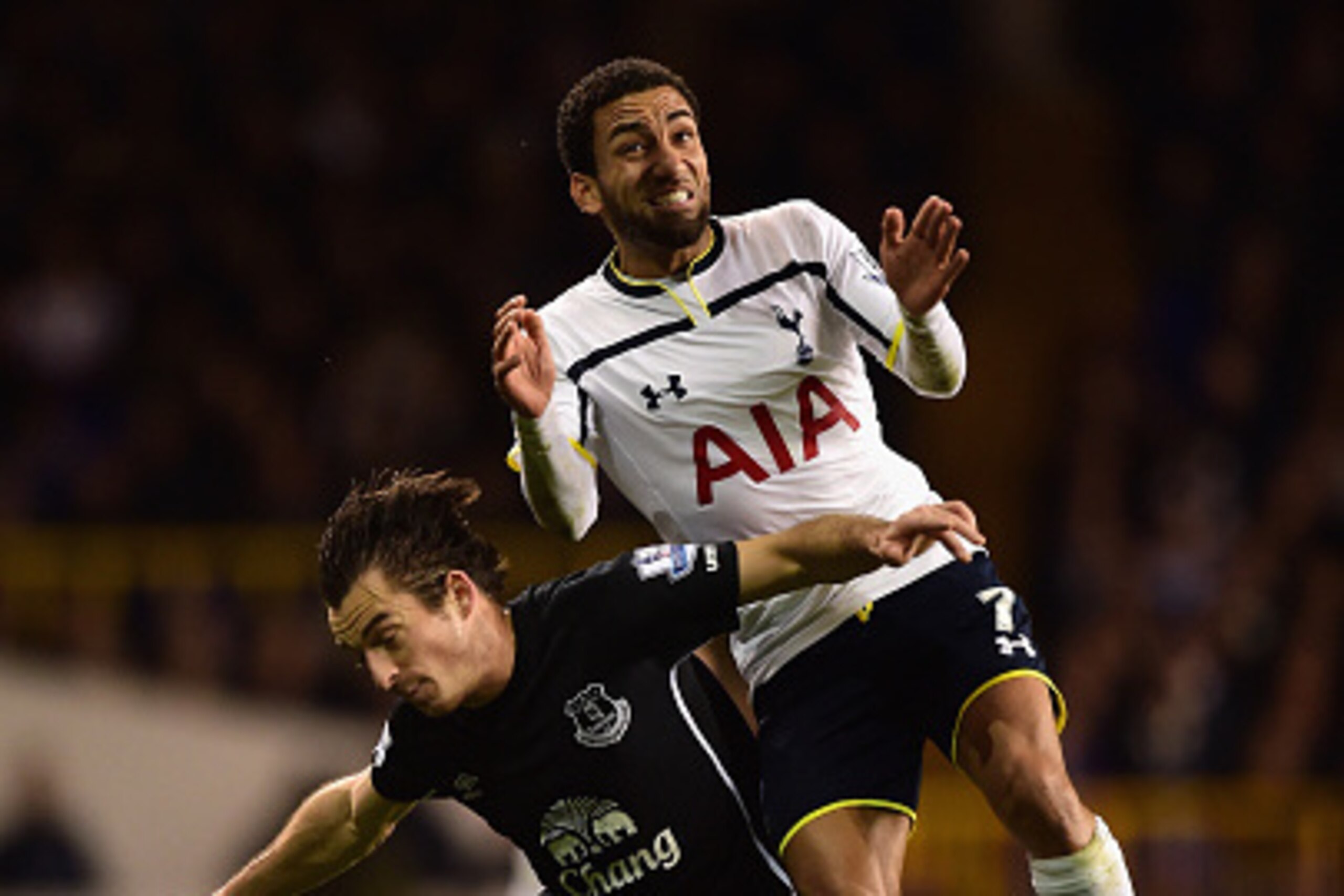 LONDON, ENGLAND - NOVEMBER 30:  Aaron Lennon of Spurs climbs above Leighton Baines of Everton to win the ball during the Barclays Premier League match between Tottenham Hotspur and Everton at White Hart Lane on November 30, 2014 in London, England.  (Phot