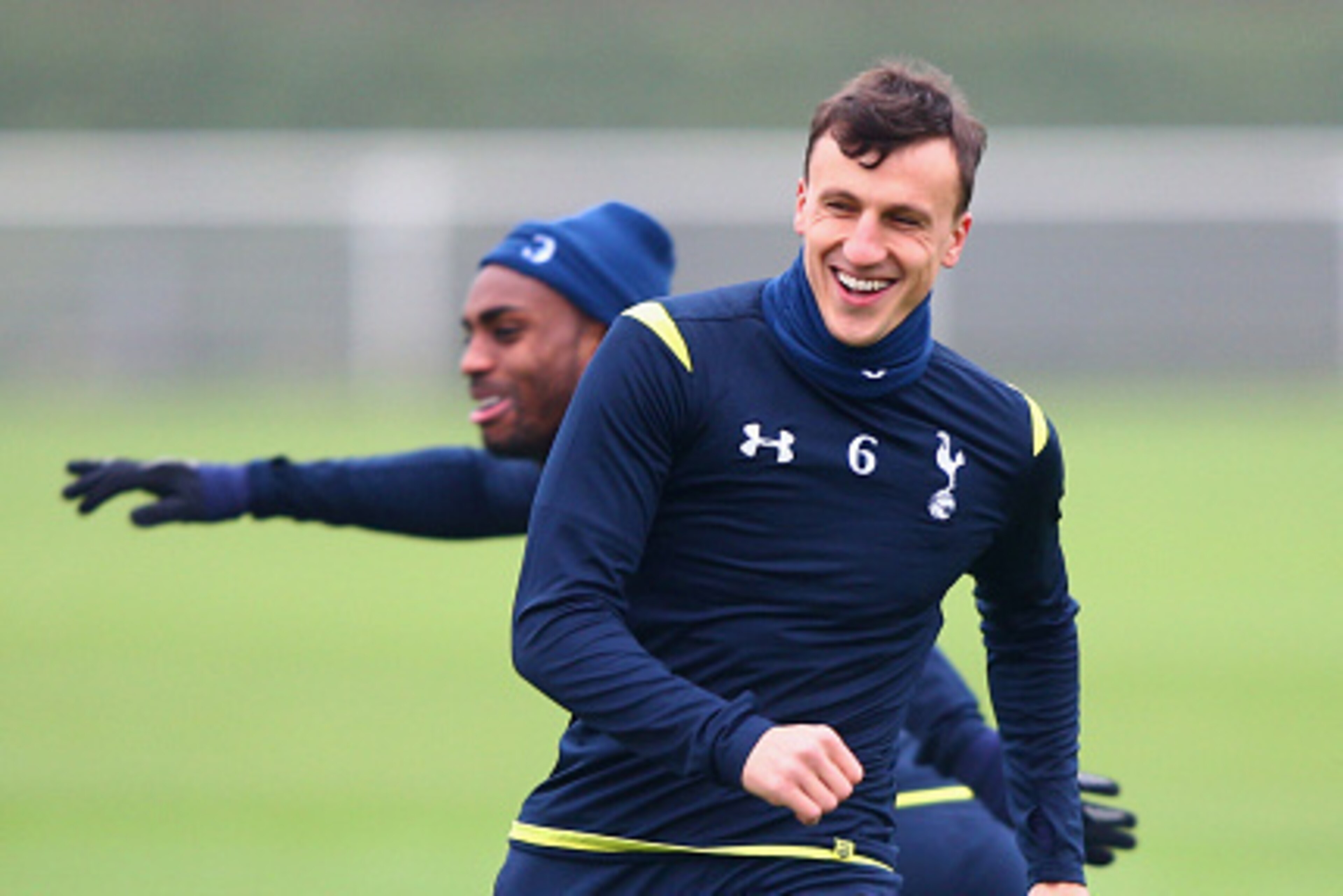 ENFIELD, ENGLAND - NOVEMBER 26:  Vlad Chiriches (6) and Danny Rose perform drills during a Tottenham Hotspur FC training session, ahead of the UEFA Europa League Group C match against FC Partizan Belgrade, at Enfield Training Centre on November 26, 2014 i
