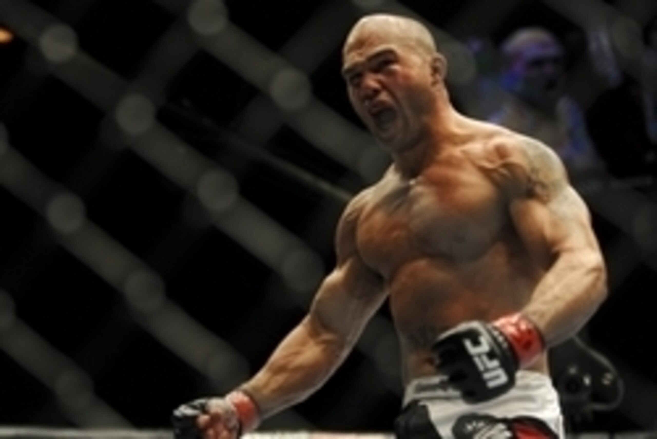 May 24, 2014; Las Vegas, NV, USA; Robbie Lawler (red) screams after finishing his UFC 173 light heavyweight bout against opponent Jake Ellenberger (blue) at MGM Grand Garden Arena. Lawler won his bout by way of TKO. Mandatory Credit: Stephen R. Sylvanie-U