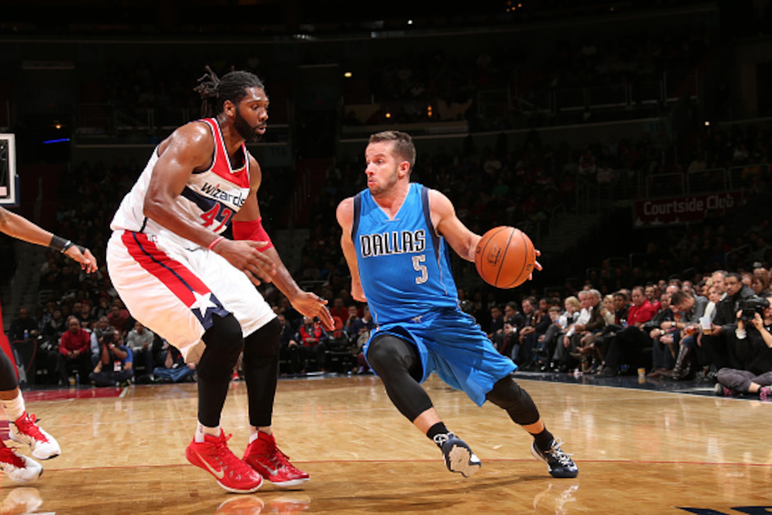 WASHINGTON, DC -  NOVEMBER 19: J.J. Barea #5 of the Dallas Mavericks handles the ball against the Washington Wizards during the game on November 19, 2014 at Verizon Center in Washington, DC. NOTE TO USER: User expressly acknowledges and agrees that, by do