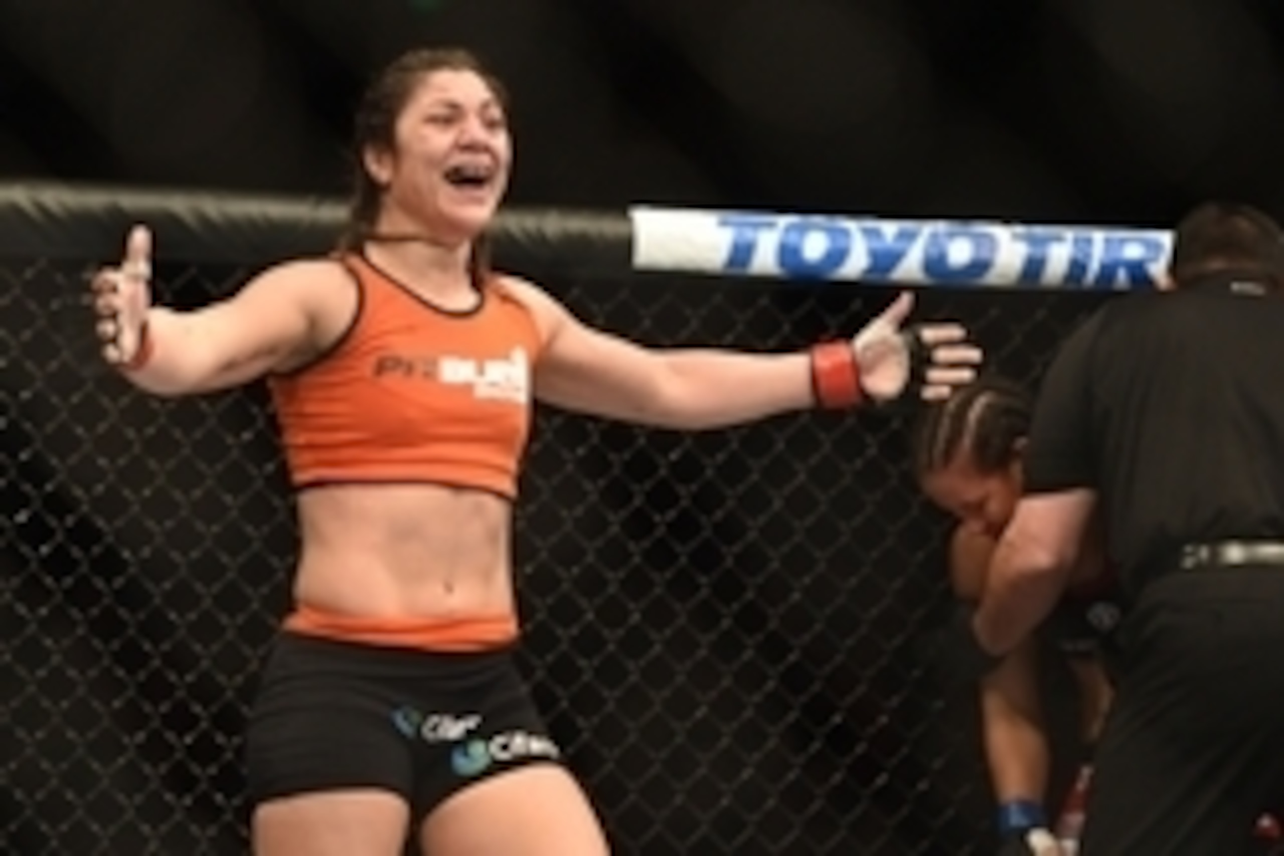 August 30, 2014; Sacramento, CA, USA; Bethe Correia (red gloves) defeats Shayna Baszler (blue gloves) during the women   s bantamweight bout of UFC 177 at Sleep Train Arena. Mandatory Credit: Kyle Terada-USA TODAY Sports