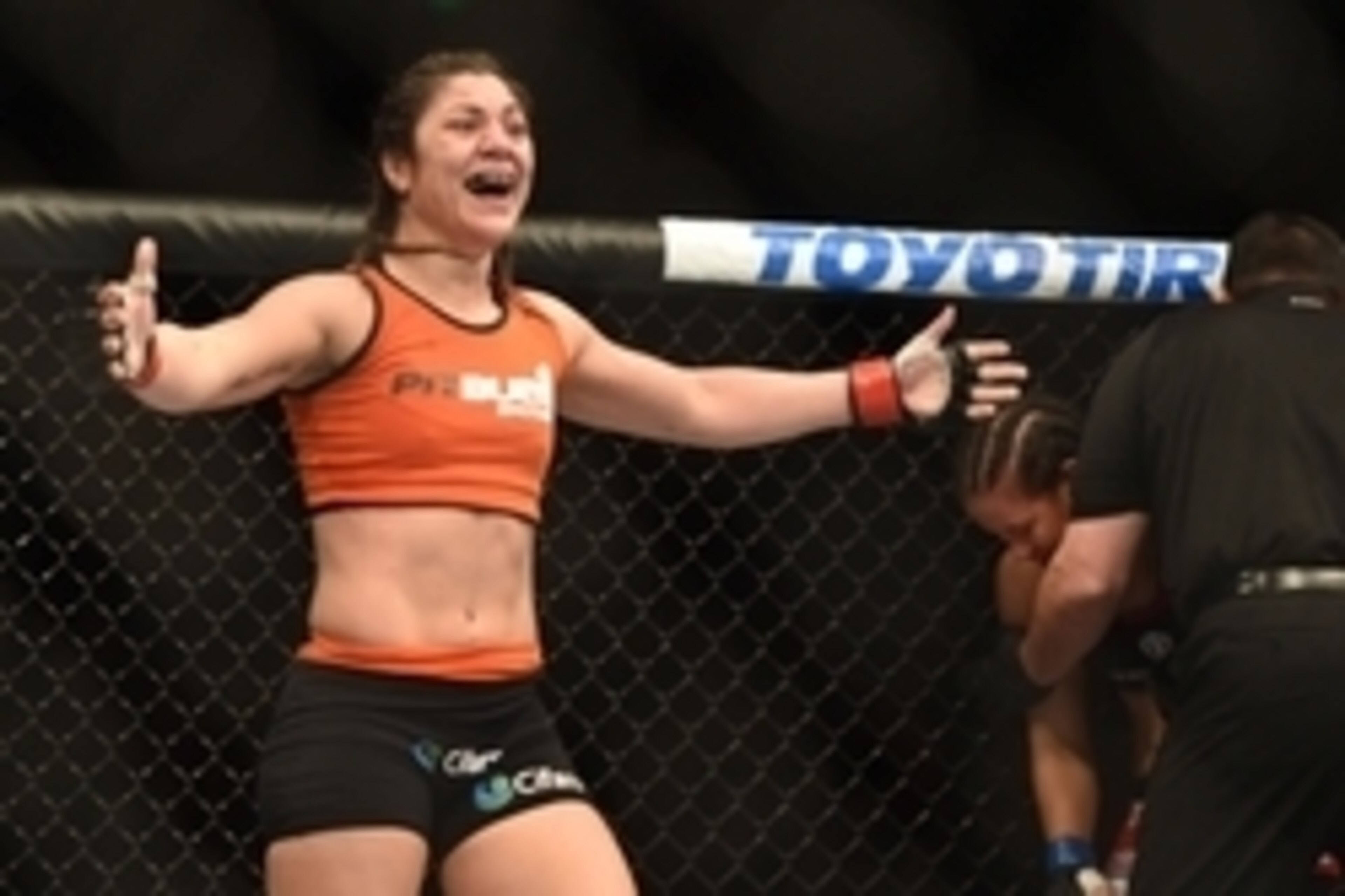 August 30, 2014; Sacramento, CA, USA; Bethe Correia (red gloves) defeats Shayna Baszler (blue gloves) during the women   s bantamweight bout of UFC 177 at Sleep Train Arena. Mandatory Credit: Kyle Terada-USA TODAY Sports