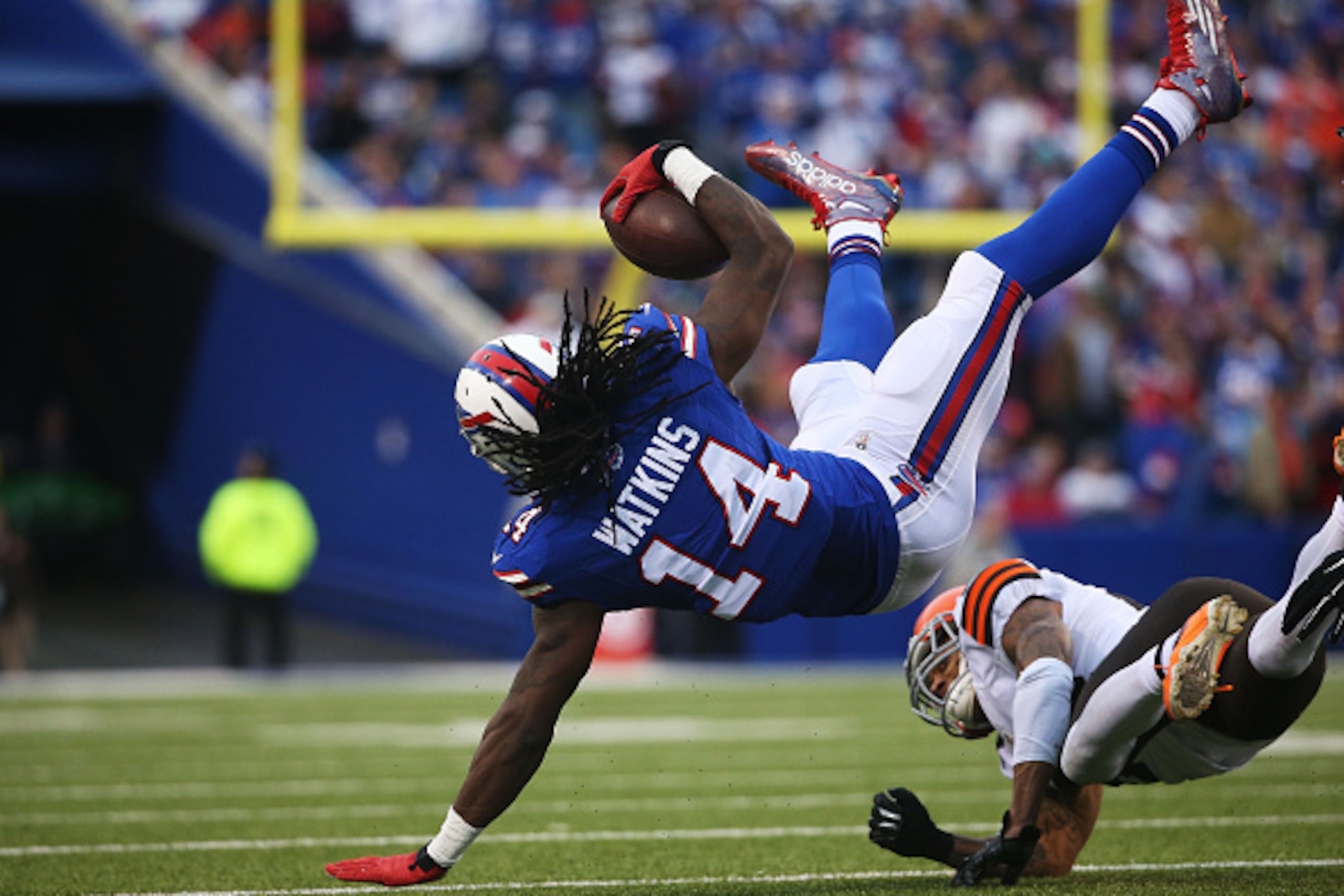 ORCHARD PARK, NY - NOVEMBER 30:  Sammy Watkins #14 of the Buffalo Bills is upended against the Cleveland Browns during the second half at Ralph Wilson Stadium on November 30, 2014 in Orchard Park, New York.  (Photo by Tom Szczerbowski/Getty Images)