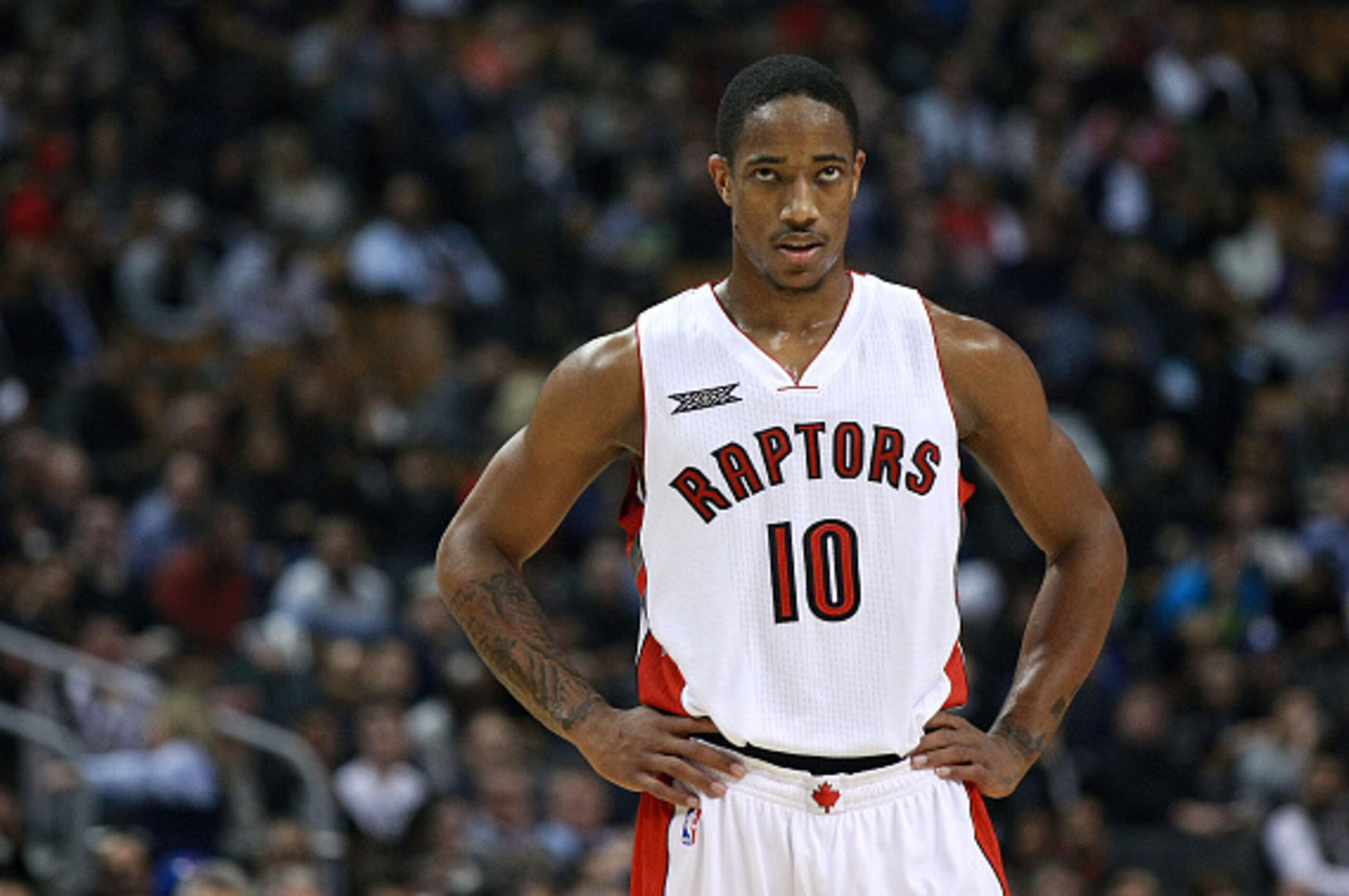 TORONTO, ON - NOVEMBER 4:  DeMar DeRozan #10 of the Toronto Raptors looks on as his team faces the Oklahoma City Thunder during their game at Air Canada Centre on November 4, 2014 in Toronto, Canada. NOTE TO USER: User expressly acknowledges and agrees th