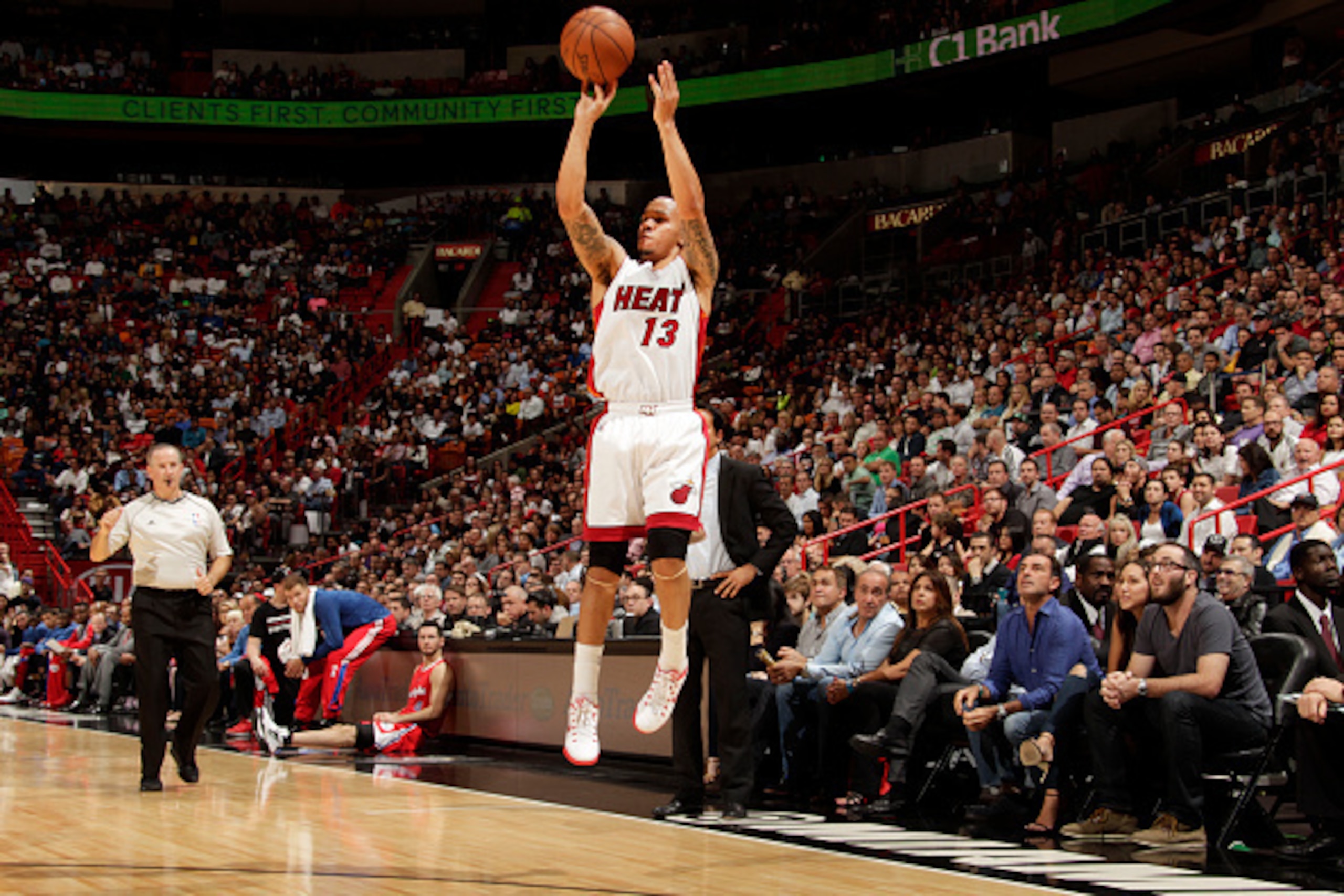 MIAMI, FL - November 20: Shabazz Napier #13 of the Miami Heat shoots against the Los Angeles Clippers during the game at the American Airlines Arena in Miami, Florida on November 20, 2014. NOTE TO USER: User expressly acknowledges and agrees that, by down