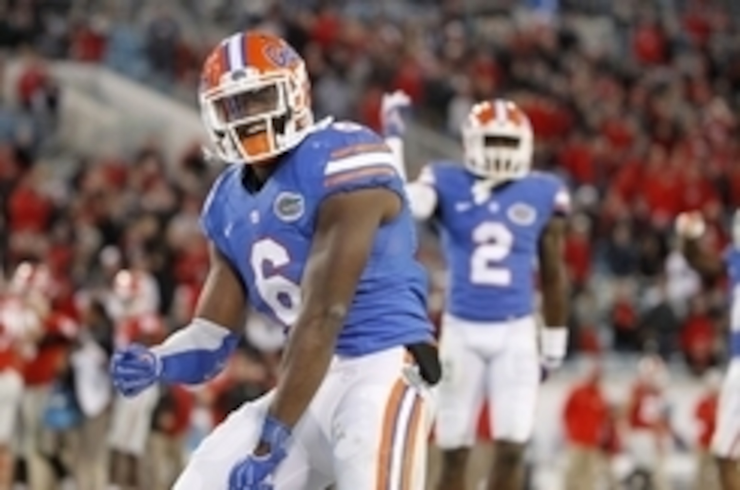 Nov 1, 2014; Jacksonville, FL, USA; Florida Gators defensive lineman Dante Fowler Jr. (6) reacts and celebrates during the second half against the Georgia Bulldogs at EverBank Field. Florida Gators defeated the Georgia Bulldogs 38-20. Mandatory Credit: Ki