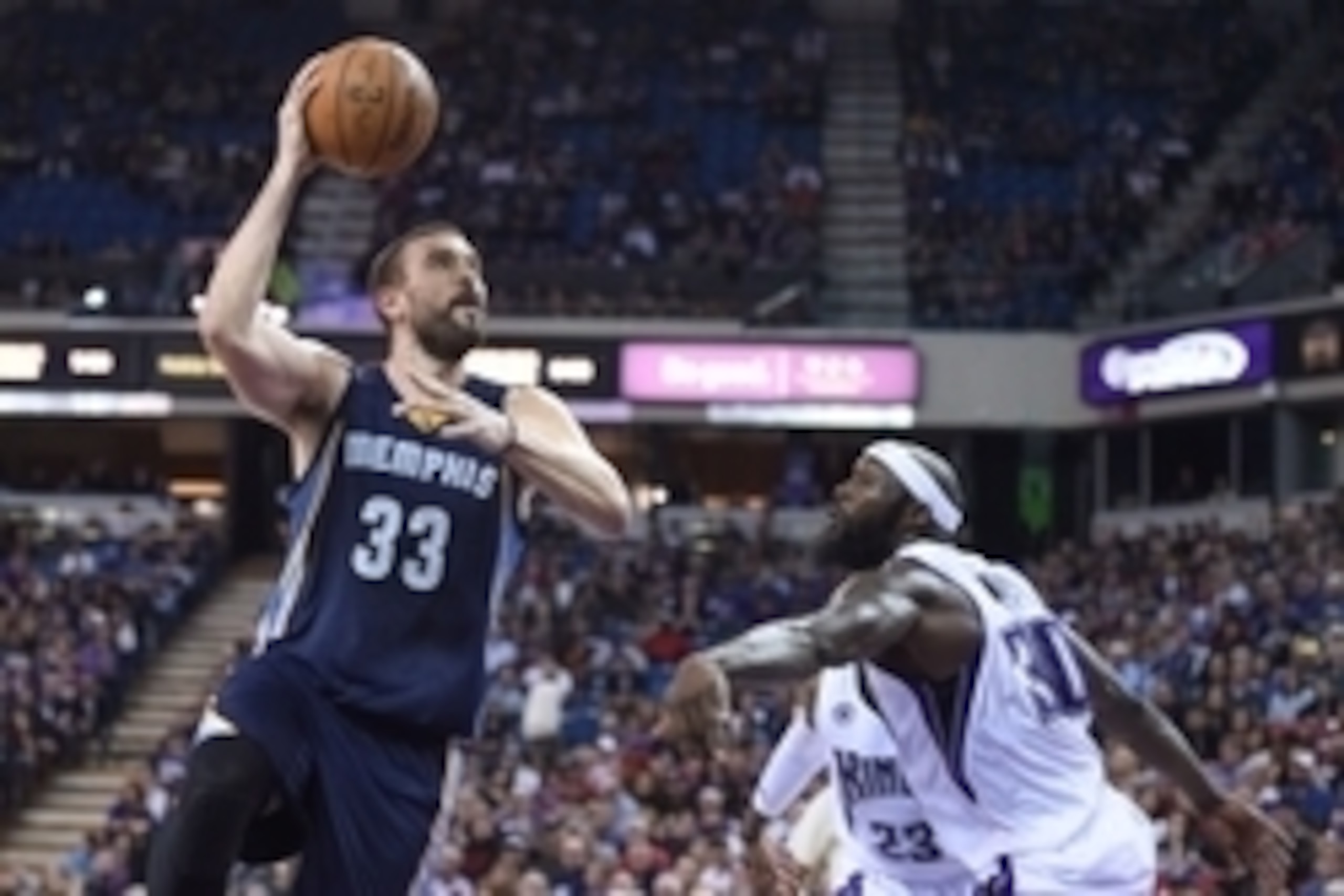 November 30, 2014; Sacramento, CA, USA; Memphis Grizzlies center Marc Gasol (33) shoots the basketball against Sacramento Kings forward Reggie Evans (30) during the third quarter at Sleep Train Arena. The Grizzlies defeated the Kings 97-85. Mandatory Cre November 30, 2014; Sacramento, CA, USA; Memphis Grizzlies center Marc Gasol (33) shoots the basketball against Sacramento Kings forward Reggie Evans (30) during the third quarter at Sleep Train Arena. The Grizzlies defeated the Kings 97-85. Mandatory Cre