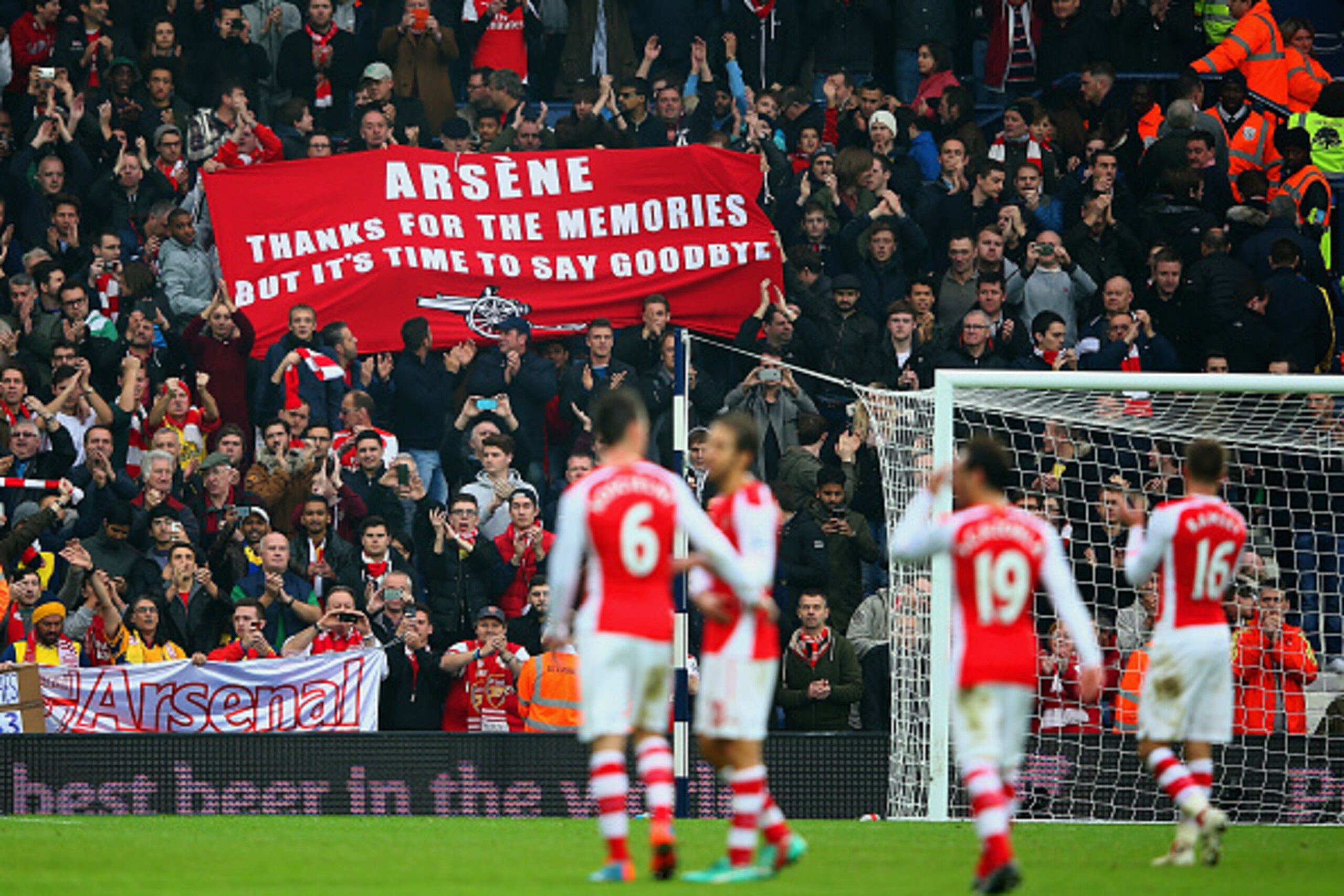 WEST BROMWICH, ENGLAND - NOVEMBER 29: Arsenal fans hold up a banner for Arsene Wenger, manager of Arsenal during the Barclays Premier League match between West Bromwich Albion and Arsenal at The Hawthorns on November 29, 2014 in West Bromwich, England  (P