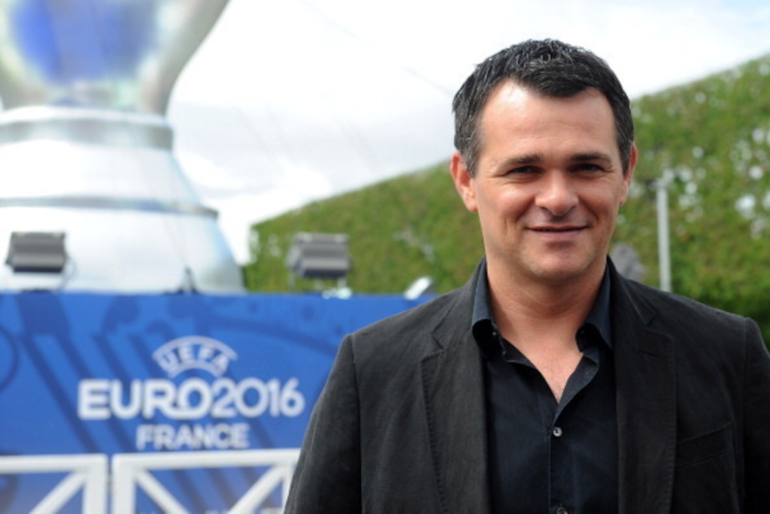 PARIS, FRANCE - JUNE 23: Former French football player Willy Sagnol poses next to an inflatable UEFA cup at the Champs de Mars on June 23, 2013 in Paris, France. (Photo by Antoine Antoniol/Getty Images) PARIS, FRANCE - JUNE 23: Former French football player Willy Sagnol poses next to an inflatable UEFA cup at the Champs de Mars on June 23, 2013 in Paris, France. (Photo by Antoine Antoniol/Getty Images)
