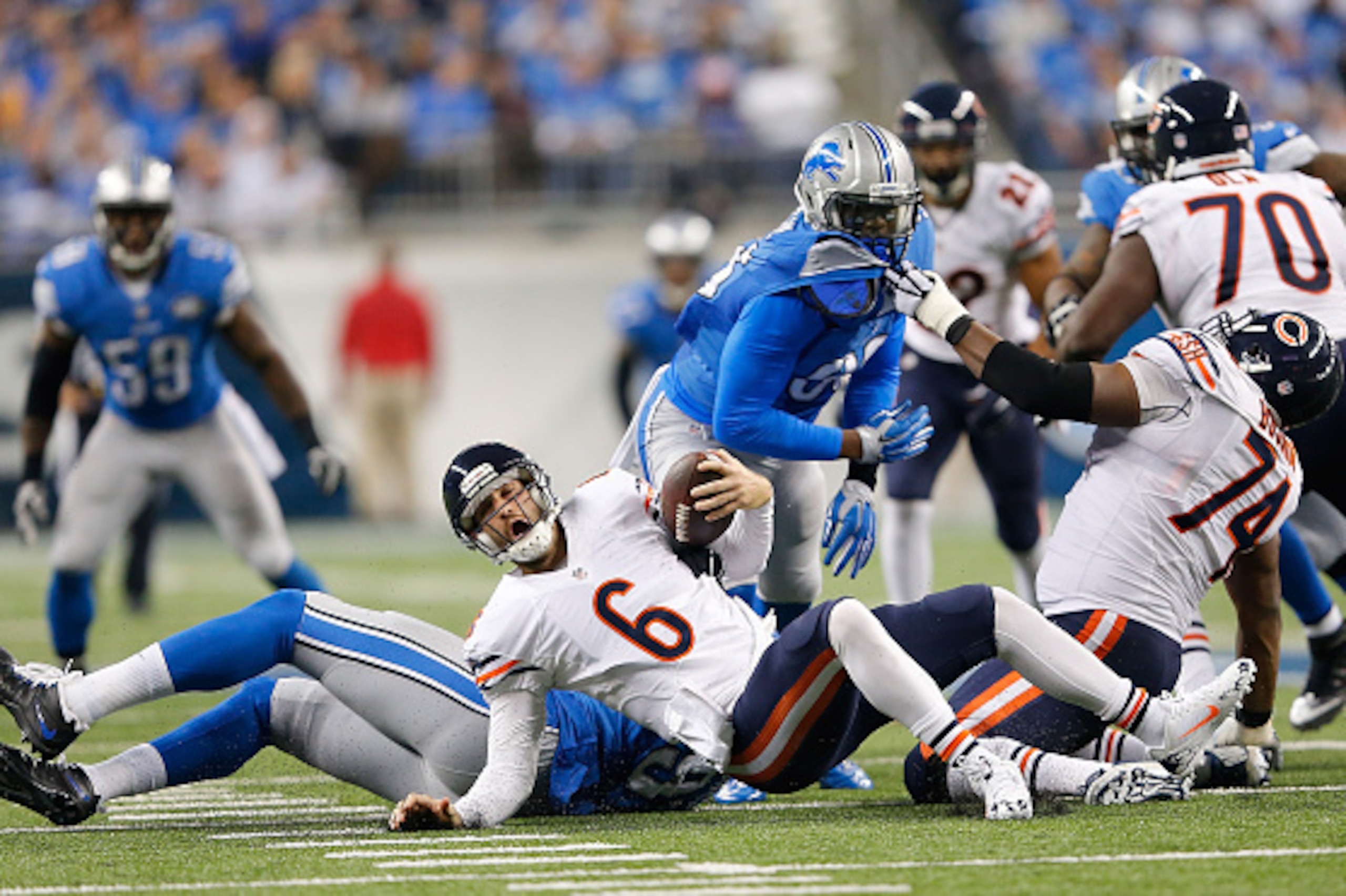 DETROIT, MI - NOVEMBER 27: Jason Jones #91 of the Detroit Lions sacks quarterback Jay Cutler #6 of the Chicago Bears during the fourth quarter of the game at Ford Field on November 27 , 2014 in Detroit, Michigan. The Lions defeated the Bears 34-17. (Photo