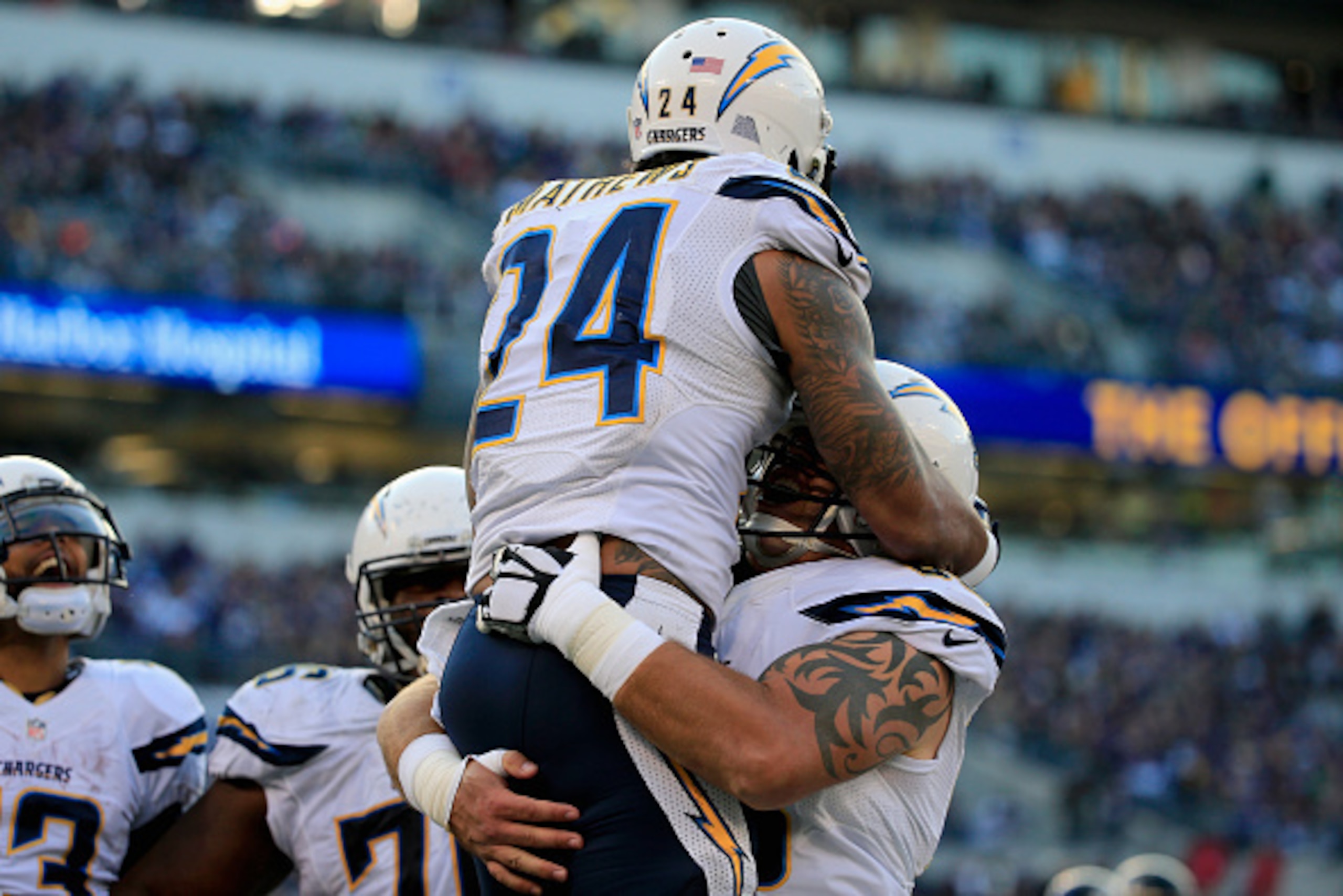 BALTIMORE, MD - NOVEMBER 30: Running back Ryan Mathews #24 of the San Diego Chargers celebrates with center Trevor Robinson #60 after scoring a fourth quarter touchdown against the Baltimore Ravens at M&T Bank Stadium on November 30, 2014 in Baltimore, Ma