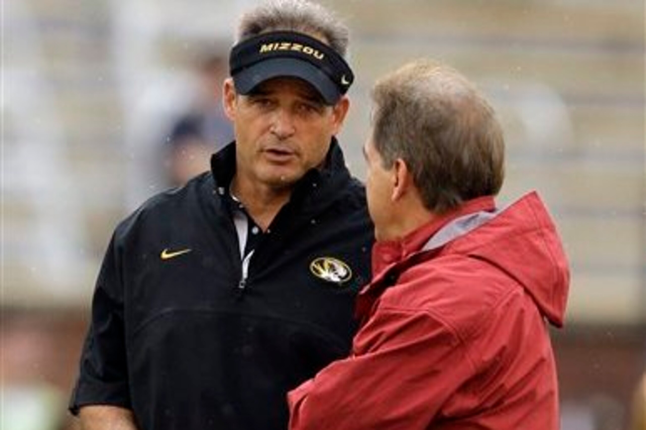 Missouri head coach Gary Pinkel (left) and Alabama head coach Nick Saban (right) Missouri head coach Gary Pinkel (left) and Alabama head coach Nick Saban (right)