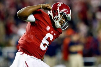 TUSCALOOSA, AL - NOVEMBER 29:  Blake Sims #6 of the Alabama Crimson Tide celebrates throwing a touchdown in the fourth quarter against the Auburn Tigers during the Iron Bowl at Bryant-Denny Stadium on November 29, 2014 in Tuscaloosa, Alabama.  (Photo by K