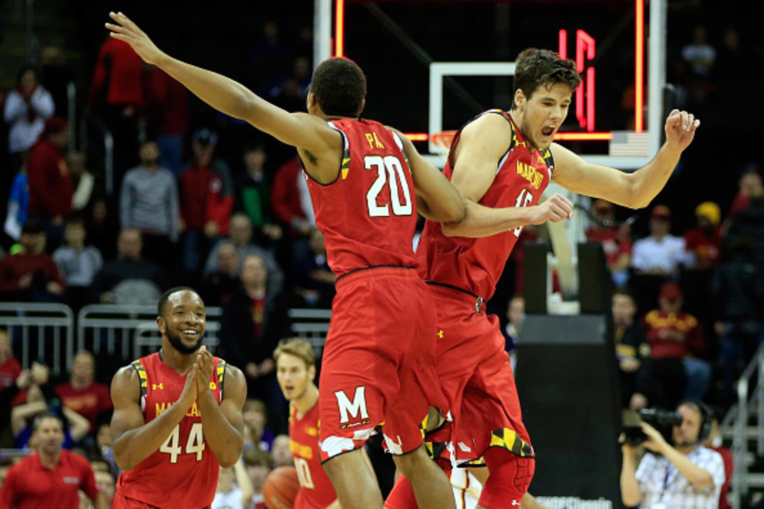 KANSAS CITY, MO - NOVEMBER 25:  Dez Wells (44), Michal Cekovsky (15), and Richaud Pack (20) of the Maryland Terrapins celebrate at the final buzzer as the Terrapins defeat the Iowa State Cyclones 72-63 to win the CBE Hall Of Fame Classic final game at Spr