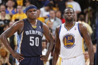 OAKLAND, CA - MARCH 28: Zach Randolph #50 of the Memphis Grizzlies and Draymond Green #23 of the Golden State Warriors on March 28, 2014 at Oracle Arena in Oakland, California. NOTE TO USER: User expressly acknowledges and agrees that, by downloading and 