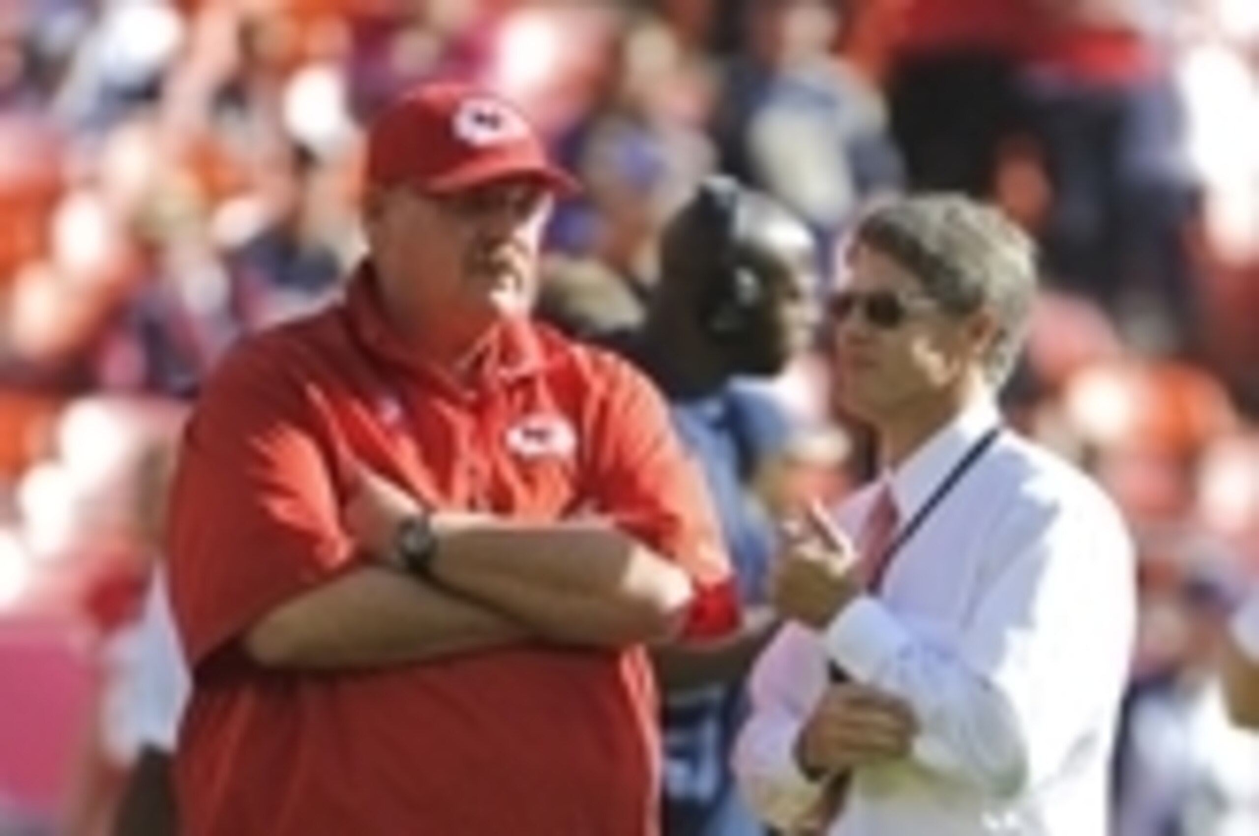 Oct 26, 2014; Kansas City, MO, USA; Kansas City Chiefs head coach Andy Reid (left) talks to Kansas City Chiefs CEO Clark Hunt (right) before the game against the St. Louis Rams at Arrowhead Stadium. Mandatory Credit: John Rieger-USA TODAY Sports