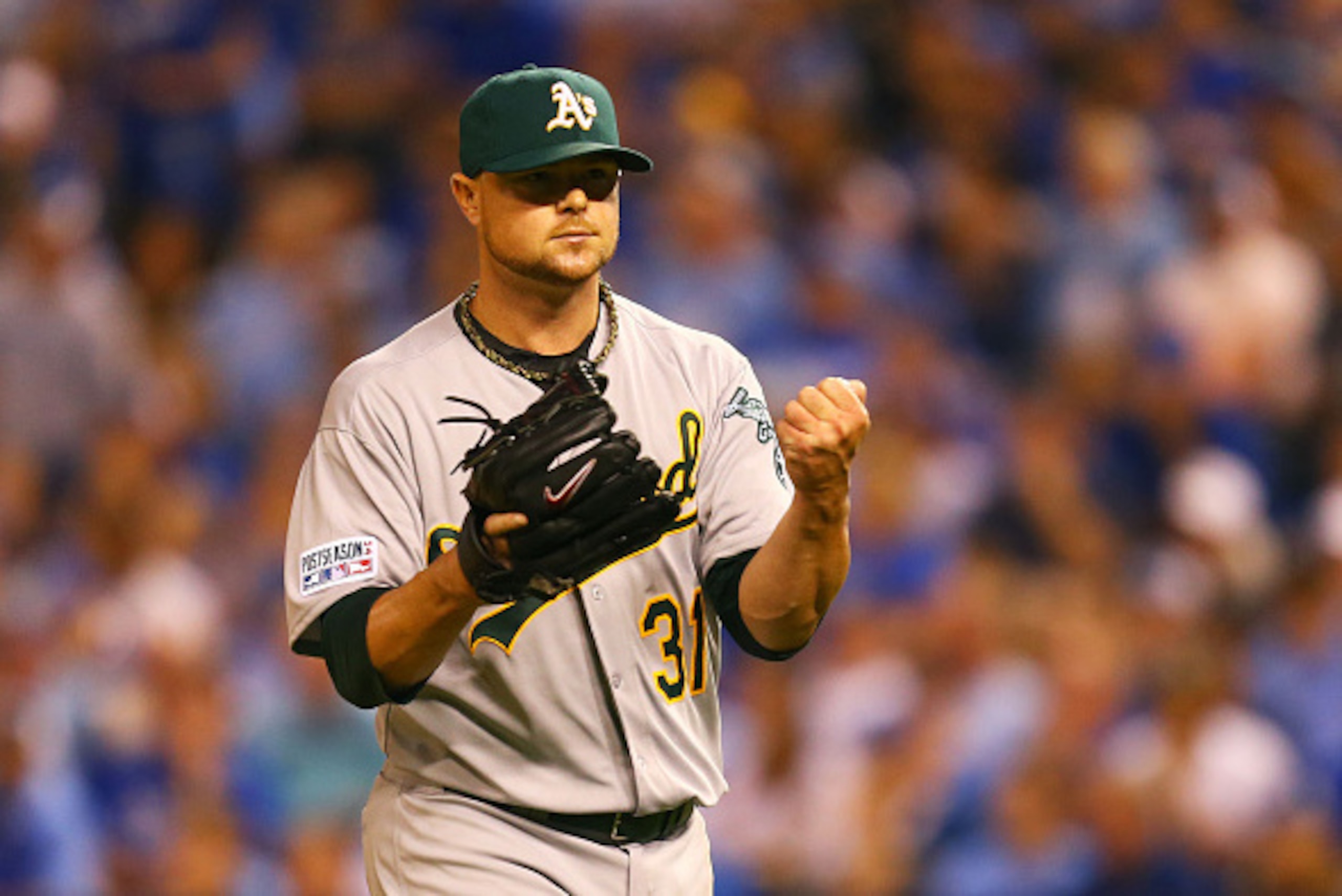 KANSAS CITY, MO - SEPTEMBER 30: Jon Lester #31 of the Oakland Athletics reacts after the third out in the seventh inning against the Kansas City Royals during the American League Wild Card game at Kauffman Stadium on September 30, 2014 in Kansas City, Mi KANSAS CITY, MO - SEPTEMBER 30: Jon Lester #31 of the Oakland Athletics reacts after the third out in the seventh inning against the Kansas City Royals during the American League Wild Card game at Kauffman Stadium on September 30, 2014 in Kansas City, Mi