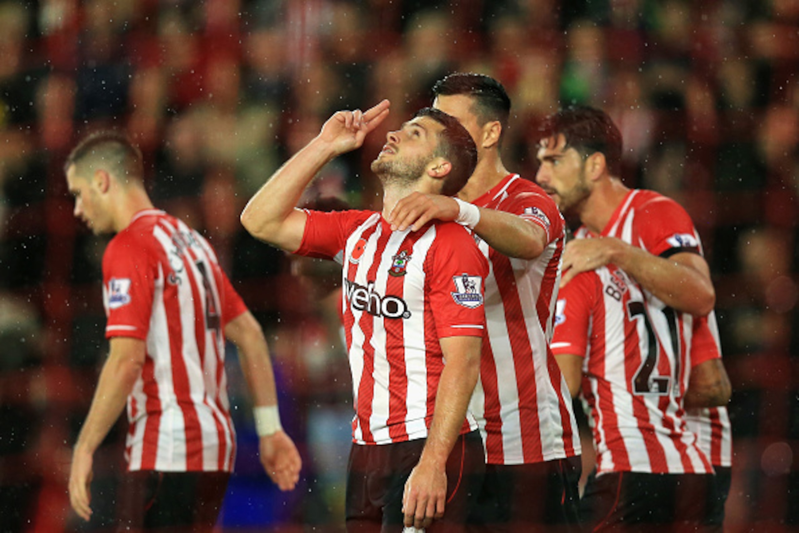 SOUTHAMPTON, ENGLAND - NOVEMBER 08: Shane Long of Southampton celebrates scoring a goal during the Barclays Premier League match between Southampton and Leicester City at St Mary's Stadium on November 8, 2014 in Southampton, England.  (Photo by David Cann