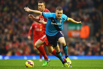 LIVERPOOL, ENGLAND - NOVEMBER 29:  Rickie Lambert of Liverpool battles with Ryan Shawcross of Stoke City during the Barclays Premier League match between Liverpool and Stoke City at Anfield on November 29, 2014 in Liverpool, England.  (Photo by Richard He