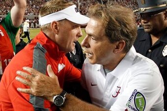 Ole Miss head coach Hugh Freeze (left) and Alabama head coach Nick Saban (right)