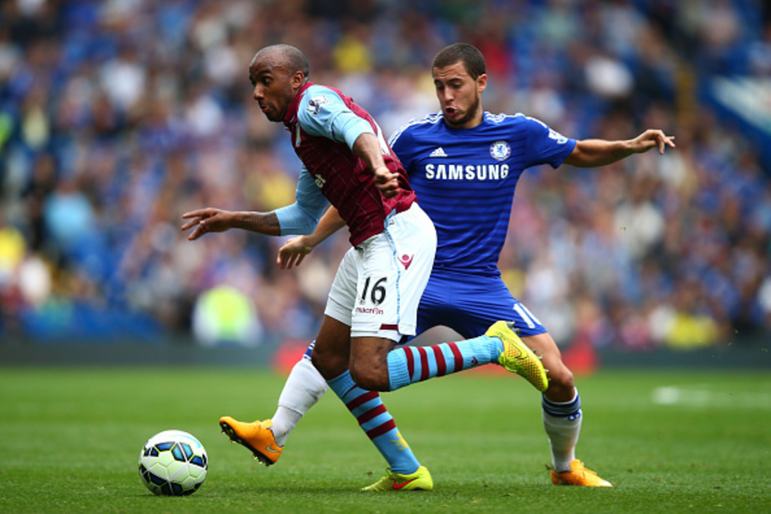 LONDON, ENGLAND - SEPTEMBER 27:  Fabian Delph of Aston Villa goes past the challenge from Eden Hazard of Chelsea during the Barclays Premier League match between Chelsea and Aston Villa at Stamford Bridge on September 27, 2014 in London, England.  (Photo 