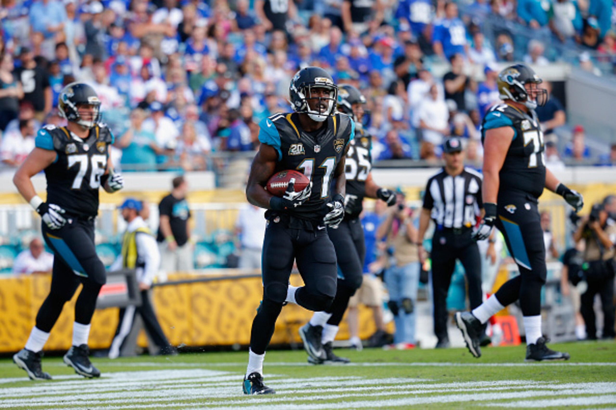 JACKSONVILLE, FL - NOVEMBER 30: Marqise Lee #11 of the Jacksonville Jaguars celebrates a touchdown in the third quarter against the New York Giants at EverBank Field on November 30, 2014 in Jacksonville, Florida.  (Photo by Chris Trotman/Getty Images)