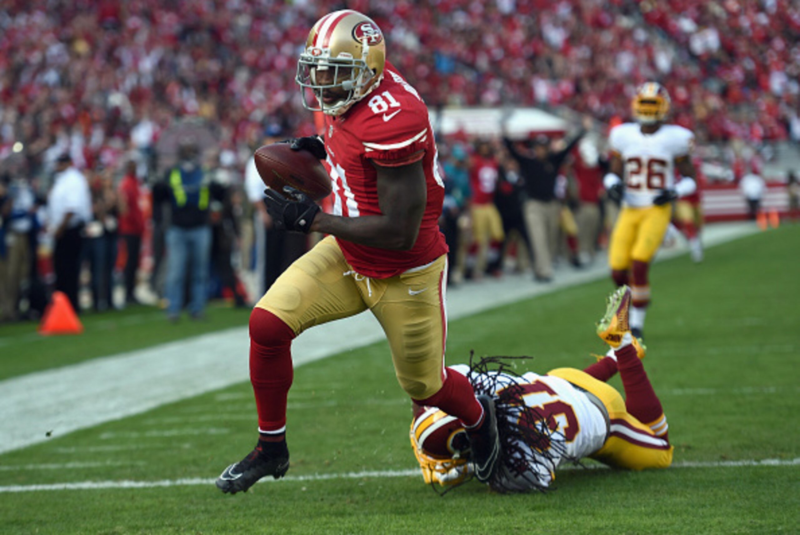 SANTA CLARA, CA - NOVEMBER 23: Anquan Boldin #81 of the San Francisco 49ers scores the first touchdown as Brandon Meriweather #31 of the Washington Redskins tries to make the tackle at Levi's Stadium on November 23, 2014 in Santa Clara, California. (Pho SANTA CLARA, CA - NOVEMBER 23: Anquan Boldin #81 of the San Francisco 49ers scores the first touchdown as Brandon Meriweather #31 of the Washington Redskins tries to make the tackle at Levi's Stadium on November 23, 2014 in Santa Clara, California. (Pho