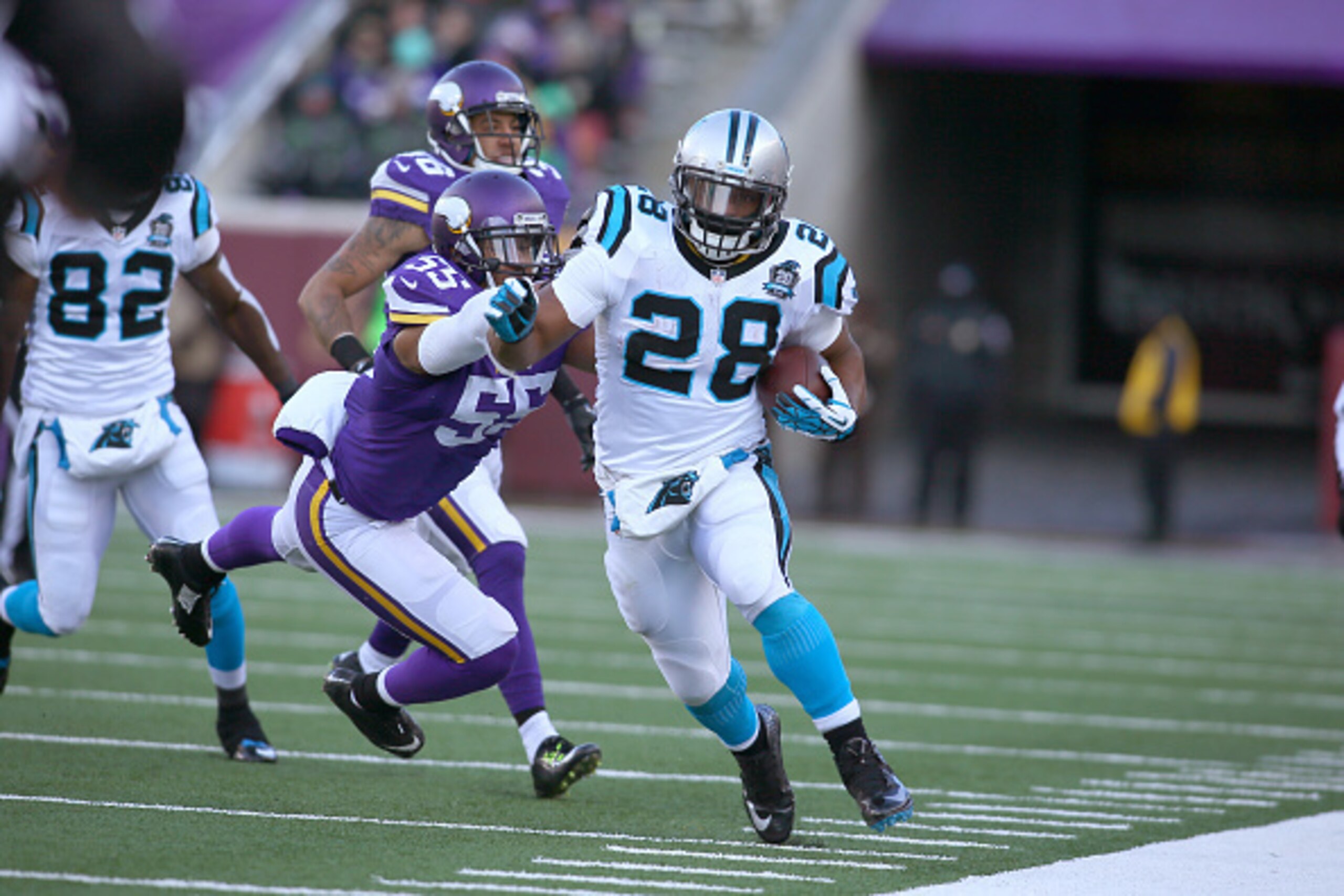MINNEAPOLIS, MN - NOVEMBER 30: Jonathan Stewart #28 of the Carolina Panthers carries the ball for a gain while Anthony Barr #55 of the Minnesota Vikings attempts to knock him out of bounds in fourth quarter on November 30, 2014 at TCF Bank Stadium in Minn