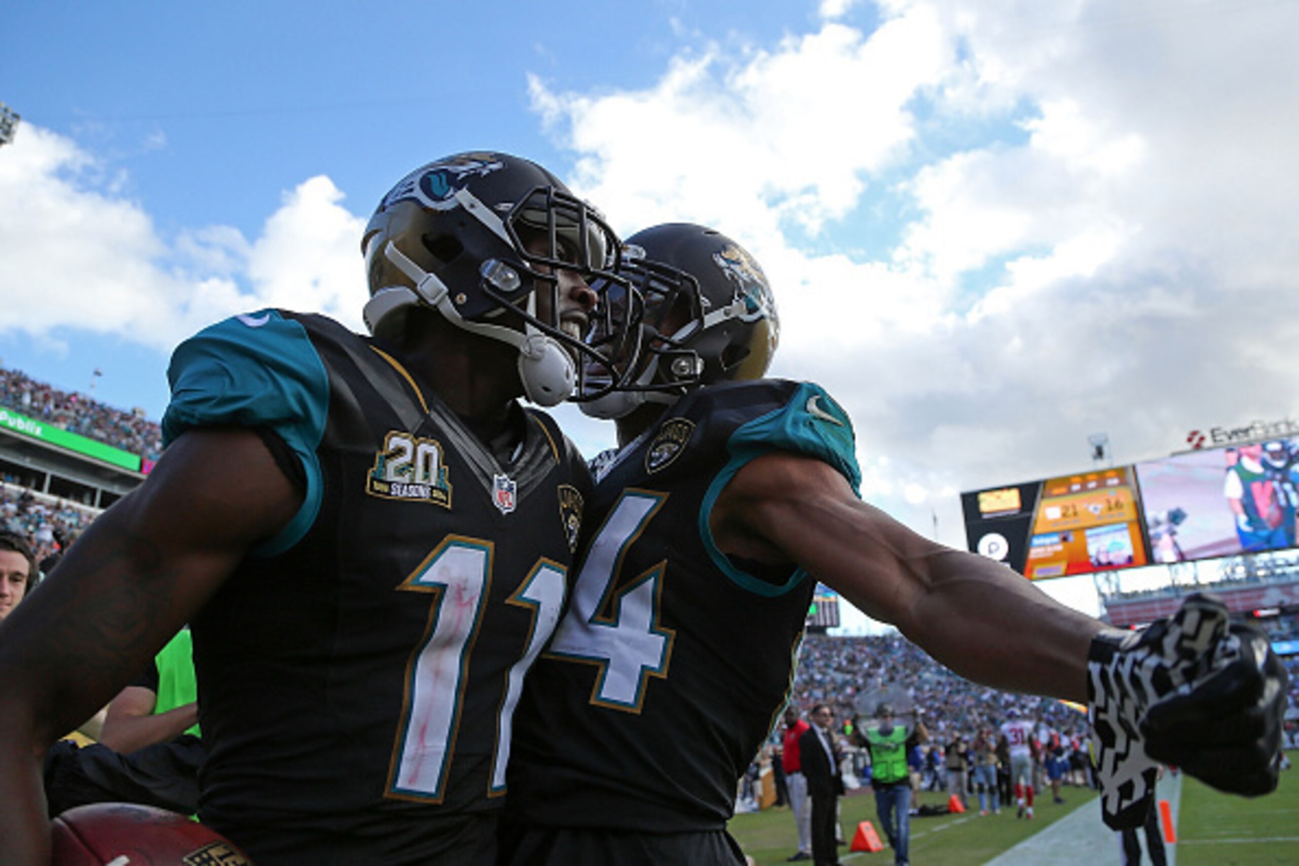 JACKSONVILLE, FL - NOVEMBER 30:  Marqise Lee #11 and Cecil Shorts #84 of the Jacksonville Jaguars celebrate after Lee scores a touchdown during the second half of the game against the New York Giants at EverBank Field on November 30, 2014 in Jacksonville,