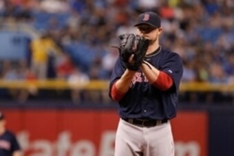 Jul 25, 2014; St. Petersburg, FL, USA; Boston Red Sox starting pitcher Jon Lester (31) throws a pitch against the Tampa Bay Rays at Tropicana Field. Mandatory Credit: Kim Klement-USA TODAY Sports