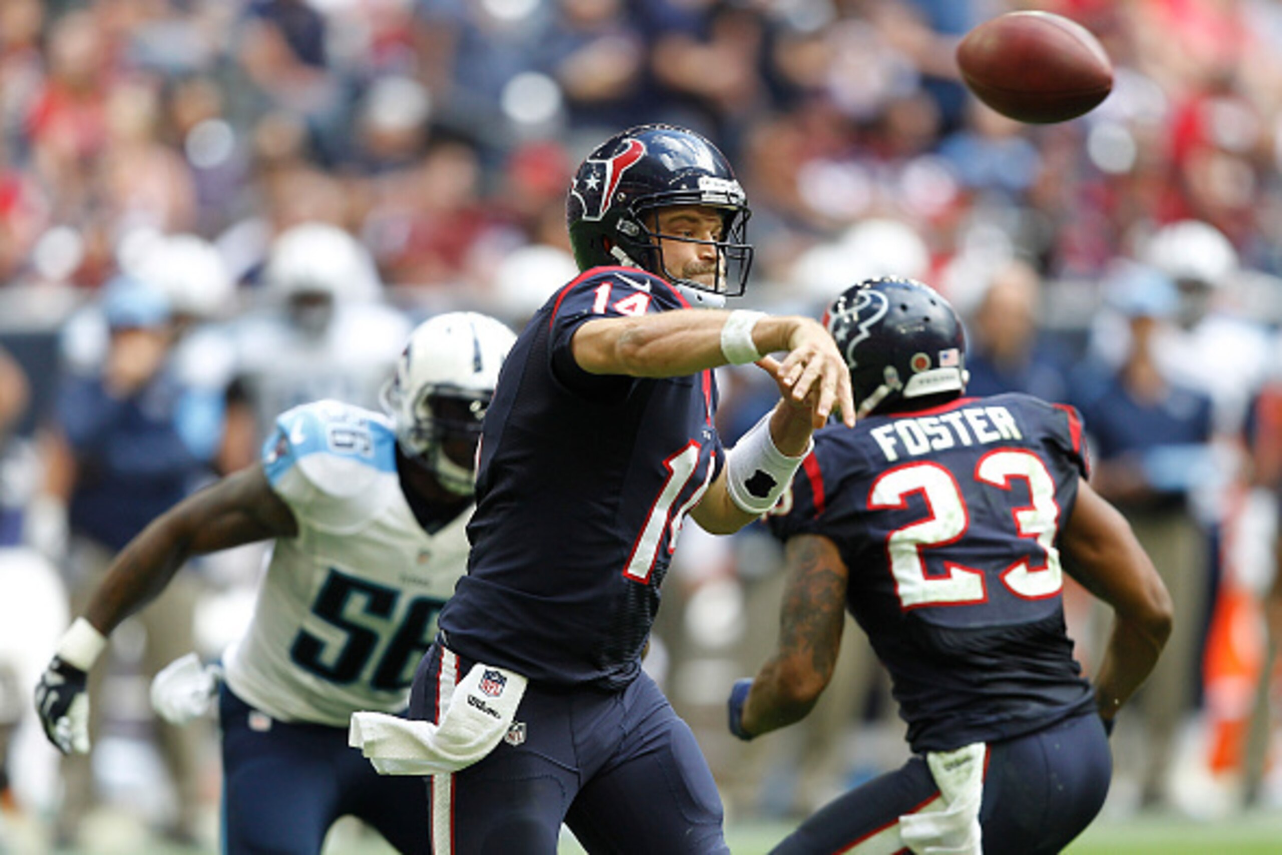 HOUSTON, TX - NOVEMBER 30: Ryan Fitzpatrick #14 of the Houston Texans passes against the Tennessee Titans in the fourth quarter in a NFL game on November 30, 2014 at NRG Stadium in Houston, Texas. (Photo by Bob Levey/Getty Images)