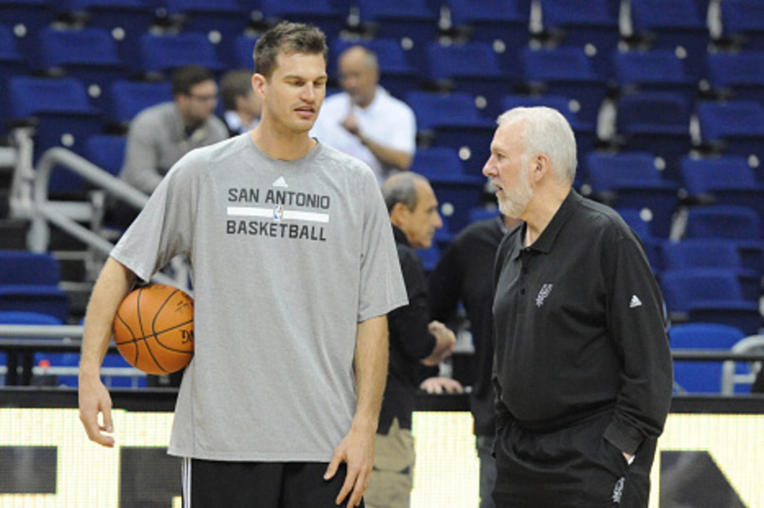 BERLIN - OCTOBER 7: Head Coach Gregg Popovich and Tiago Splitter #22 of the San Antonio Spurs talk during practice as part of the 2014 Global Games on October 7, 2014 at the O2 Arena in Berlin, Germany. NOTE TO USER: User expressly acknowledges and agrees BERLIN - OCTOBER 7: Head Coach Gregg Popovich and Tiago Splitter #22 of the San Antonio Spurs talk during practice as part of the 2014 Global Games on October 7, 2014 at the O2 Arena in Berlin, Germany. NOTE TO USER: User expressly acknowledges and agrees