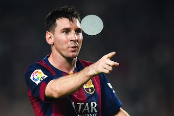 BARCELONA, SPAIN - NOVEMBER 22:  Lionel Messi of FC Barcelona celebrates  after scoring his team's fourth goal during the La Liga match between FC Barcelona and Sevilla FC at Camp Nou on November 22, 2014 in Barcelona, Spain. Lionel Messi beat the record 