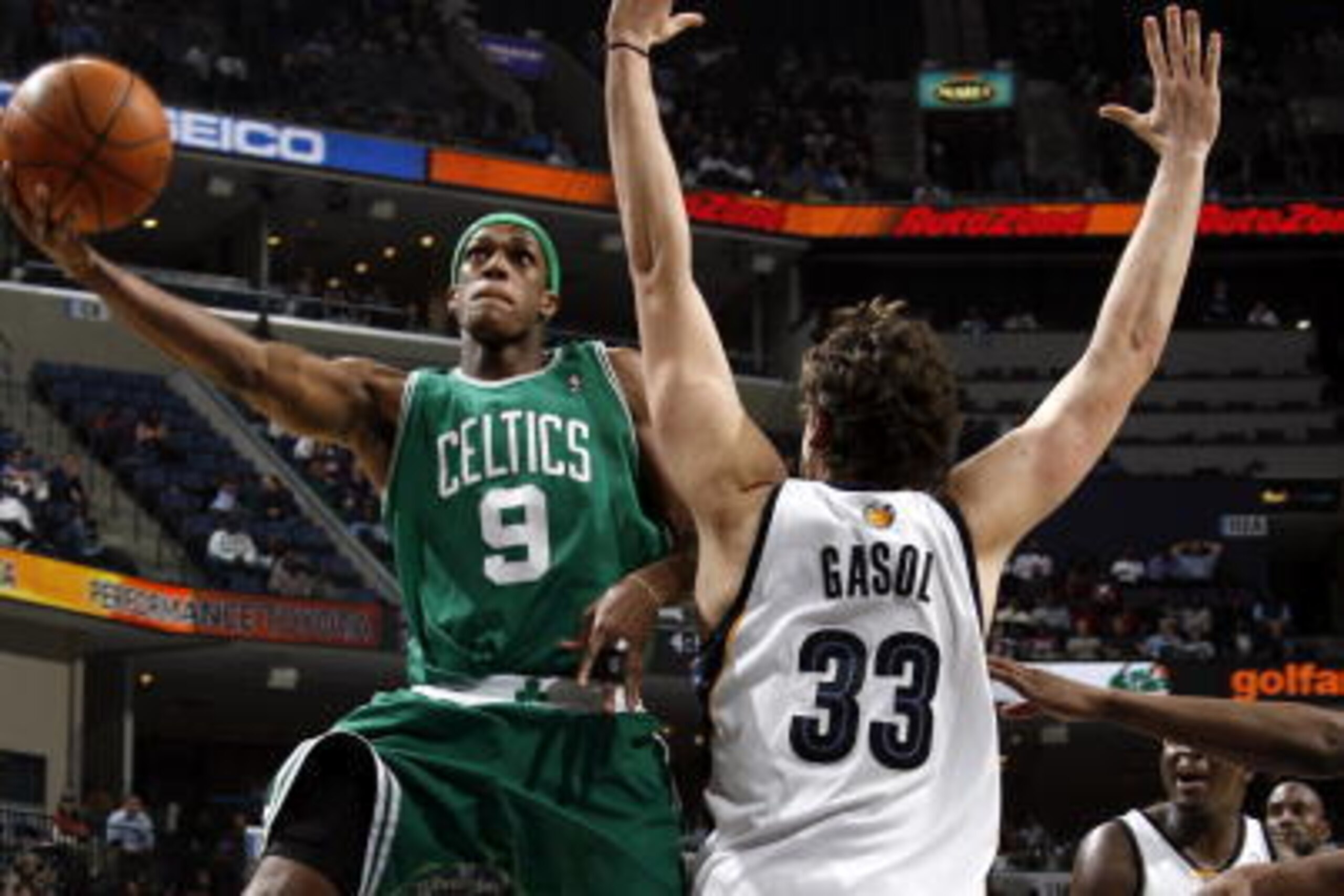 MEMPHIS, TN - DECEMBER 14: Rajon Rondo #9 of the Boston Celtics shoots a layup over Marc Gasol #33 of the Memphis Grizzlies on December 14, 2009 at FedExForum in Memphis, Tennessee. NOTE TO USER: User expressly acknowledges and agrees that, by download MEMPHIS, TN - DECEMBER 14: Rajon Rondo #9 of the Boston Celtics shoots a layup over Marc Gasol #33 of the Memphis Grizzlies on December 14, 2009 at FedExForum in Memphis, Tennessee. NOTE TO USER: User expressly acknowledges and agrees that, by download