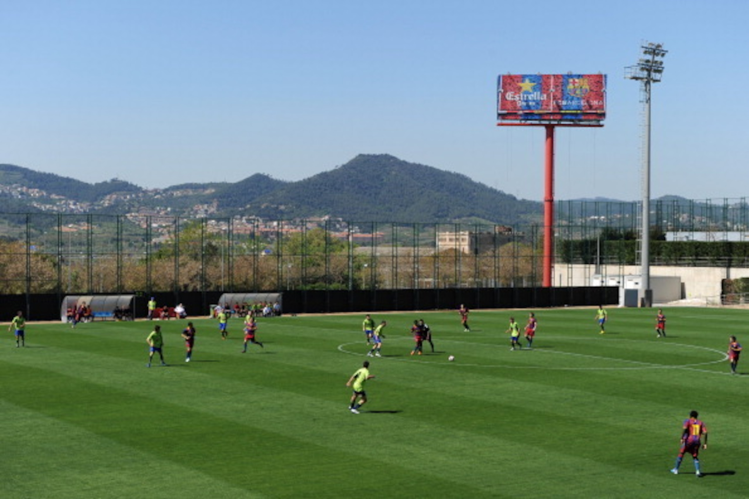 BARCELONA, SPAIN - APRIL 09:  Barcelona youth players play a match on one of the pitches at the Joan Camper training ground on April 9, 2011 in Barcelona, Spain. Every weekend various teams of Barcelona youth players play in matches with the hope of one d