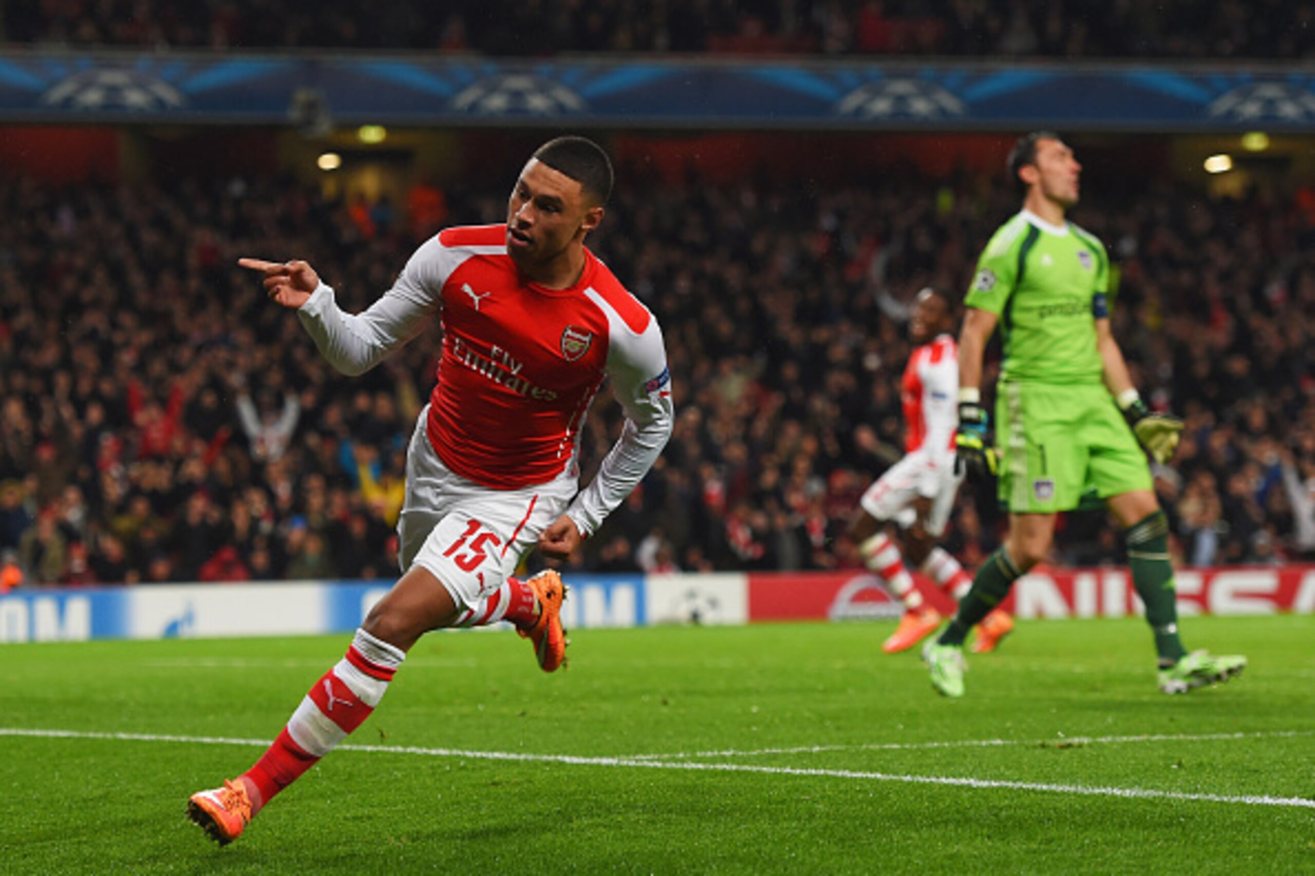 LONDON, ENGLAND - NOVEMBER 04:  Despair for Silvio Proto of Anderlecht (R) as Alex Oxlade-Chamberlain of Arsenal celebrates as he scores their third goal during the UEFA Champions League Group D match between Arsenal FC and RSC Anderlecht at Emirates Stad