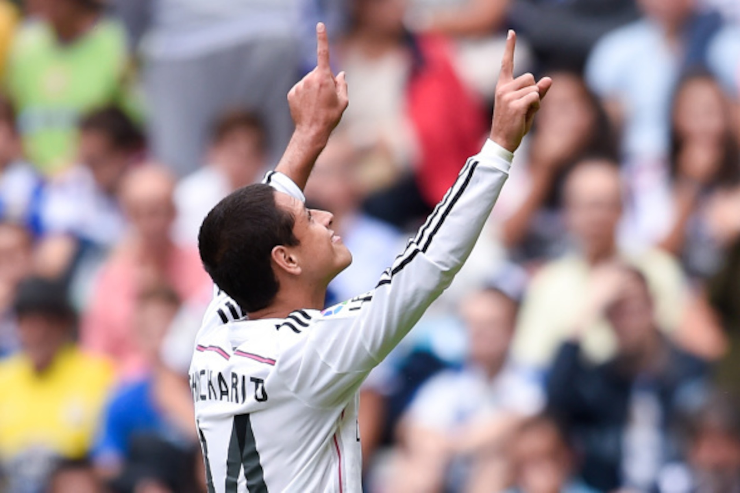 LA CORUNA, SPAIN - SEPTEMBER 20:  Chicharito Hernandez of Real Madrid CF celebrates after scoring his team's eighth goal during the La Liga match between RC Deportivo La Coruna and Real Madrid CF at Riazor Stadium on September 20, 2014 in La Coruna, Spain