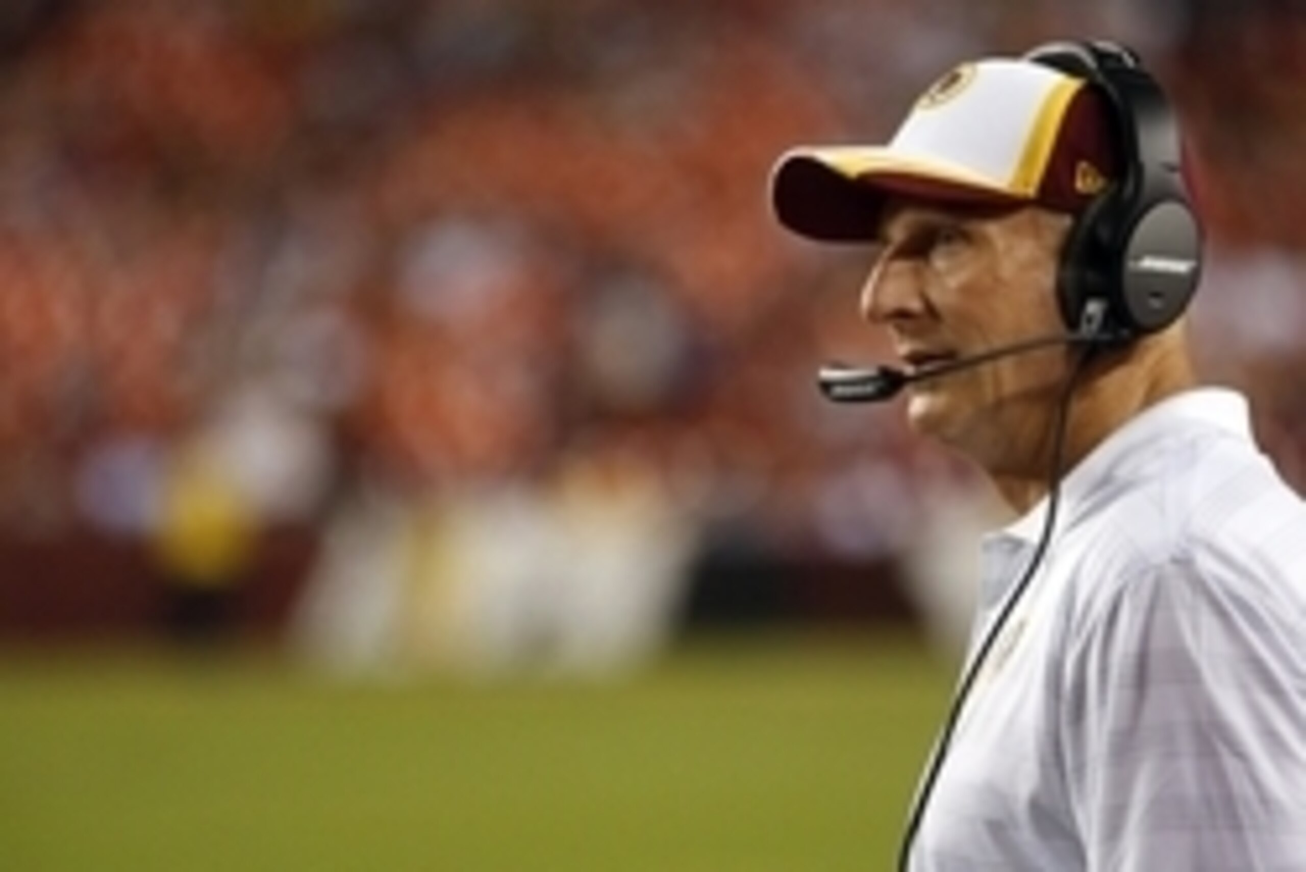 Aug 7, 2014; Landover, MD, USA; Washington Redskins defensive coordinator Jim Haslett looks on from the sidelines against the New England Patriots in the third quarter at FedEx Field. The Redskins won 23-6. Mandatory Credit: Geoff Burke-USA TODAY Sports