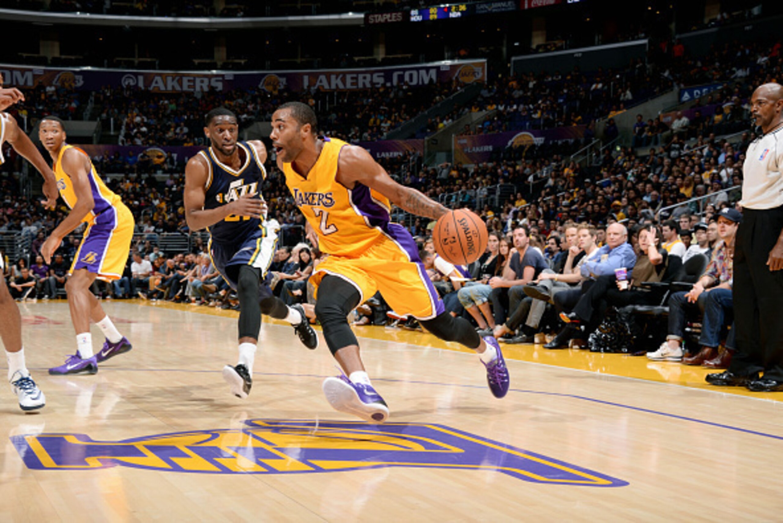 LOS ANGELES, CA - OCTOBER 19: Wayne Ellington #2 of the Los Angeles Lakers drives against the Utah Jazz at STAPLES Center on October 19, 2014 in Los Angeles, California. NOTE TO USER: User expressly acknowledges and agrees that, by downloading and/or usin LOS ANGELES, CA - OCTOBER 19: Wayne Ellington #2 of the Los Angeles Lakers drives against the Utah Jazz at STAPLES Center on October 19, 2014 in Los Angeles, California. NOTE TO USER: User expressly acknowledges and agrees that, by downloading and/or usin