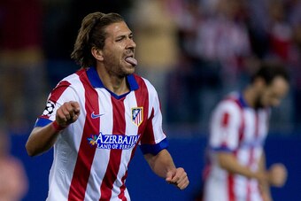 MADRID, SPAIN - OCTOBER 22: Alessio Cerci of Atletico de Madrid celebrates scoring their fifth goal during the UEFA Champions League group A match between Club Atletico de Madrid and Malmo FF at Vicente Calderon stadium on October 22, 2014 in Madrid, Spai