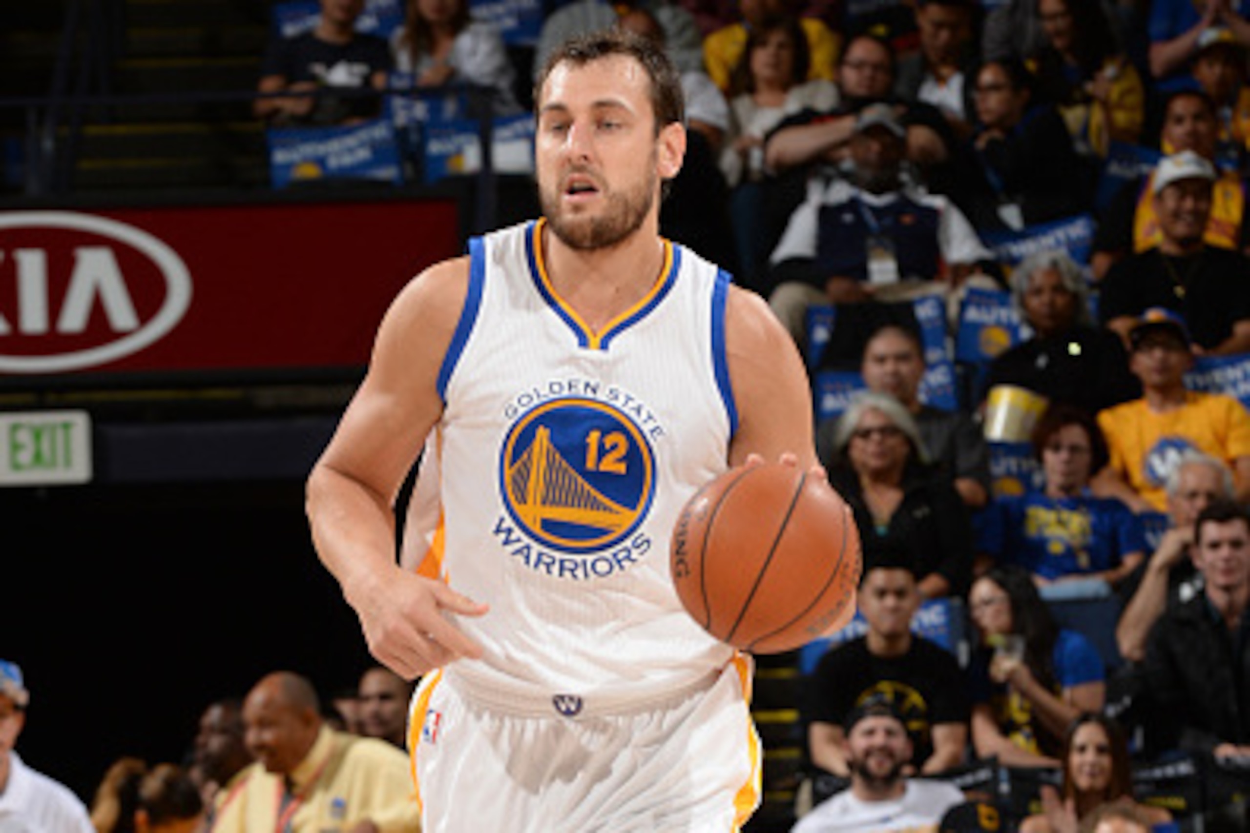 Oakland, CA- OCTOBER 24: Andrew Bogut #12 of the Golden State Warriors handles the ball against the Denver Nuggets at the Oracle Arena in Oakland, California on October 24, 2014 . NOTE TO USER: User expressly acknowledges and agrees that, by downloading a