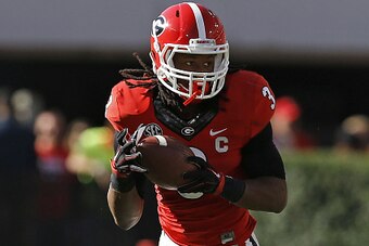 ATHENS, GA - OCTOBER 04:  Running back Todd Gurley #3 of the Georgia Bulldogs rushes with the ball against the Vanderbilt Commodores at Sanford Stadium on October 4, 2014 in Athens, Georgia.  (Photo by Mike Zarrilli/Getty Images)