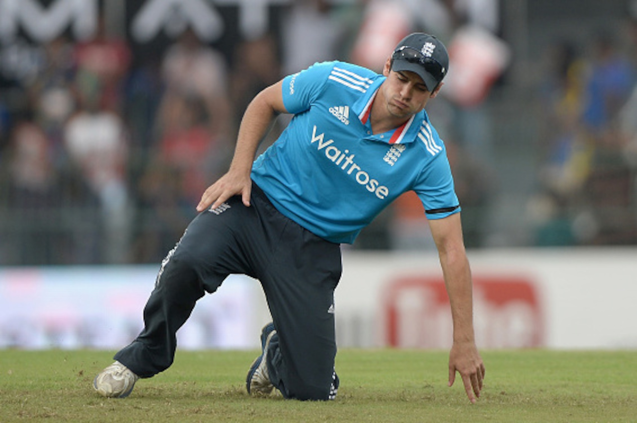 COLOMBO, SRI LANKA - NOVEMBER 29:  England captain Alastair Cook misfields during the 2nd One Day International match between Sri Lanka and England at R. Premadasa Stadium on November 29, 2014 in Colombo, Sri Lanka.  (Photo by Gareth Copley/Getty Images,)