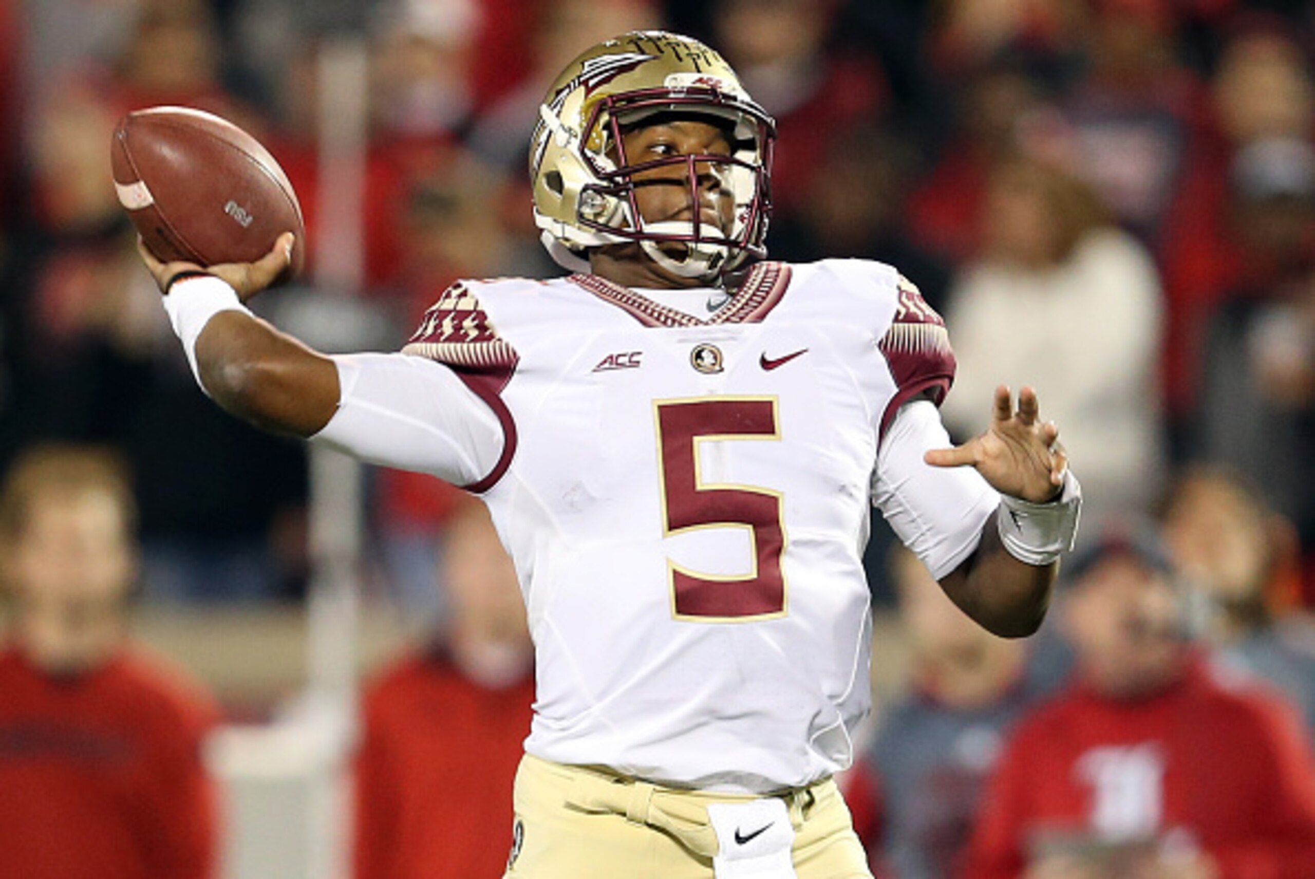 LOUISVILLE, KY - OCTOBER 30:  Jameis Winston #5 of the Florida State Seminoles throws a pass in the fourth quarter against the Louisville Cardinals during their game at Papa John's Cardinal Stadium on October 30, 2014 in Louisville, Kentucky.  (Photo by A