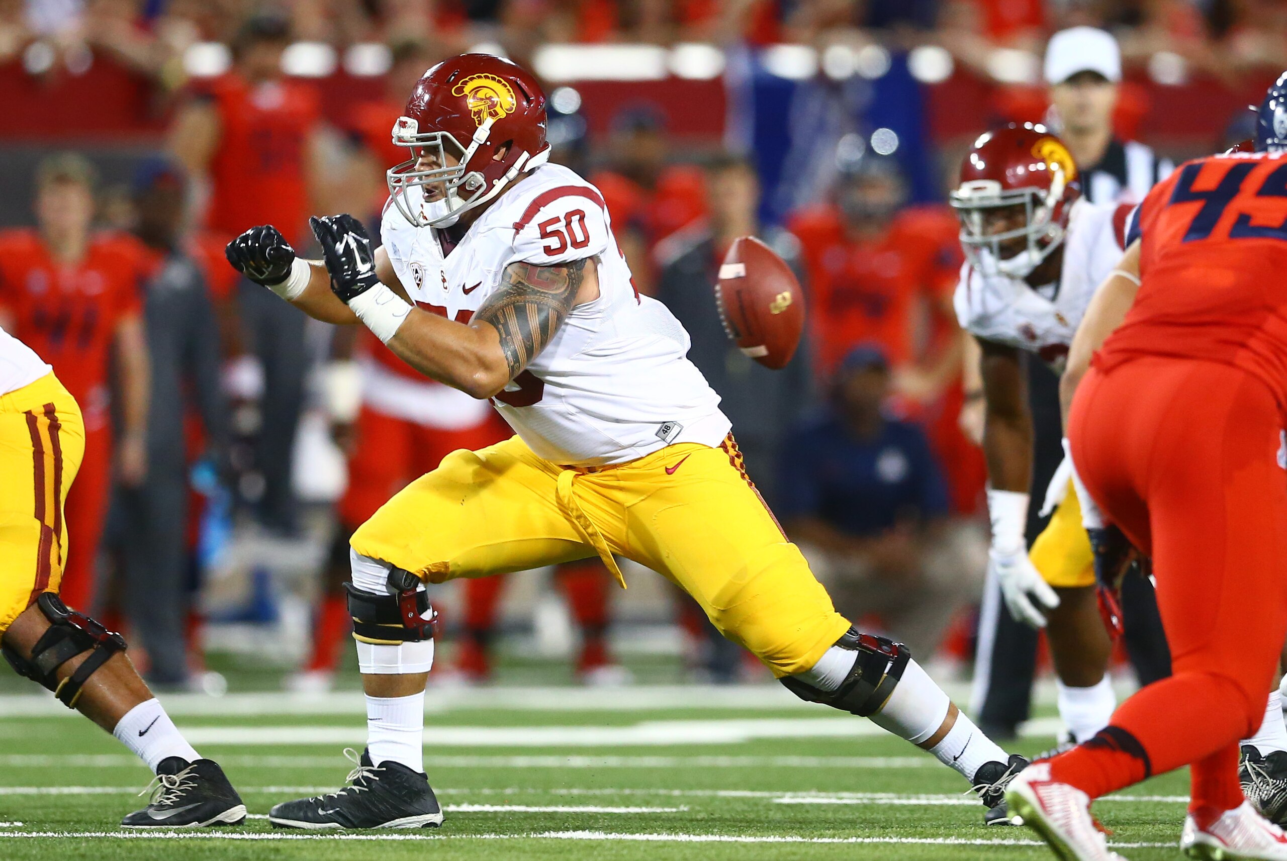 Oct 11, 2014; Tucson, AZ, USA; Southern California Trojans guard Toa Lobendahn (50) against the Arizona Wildcats at Arizona Stadium. Mandatory Credit: Mark J. Rebilas-USA TODAY Sports