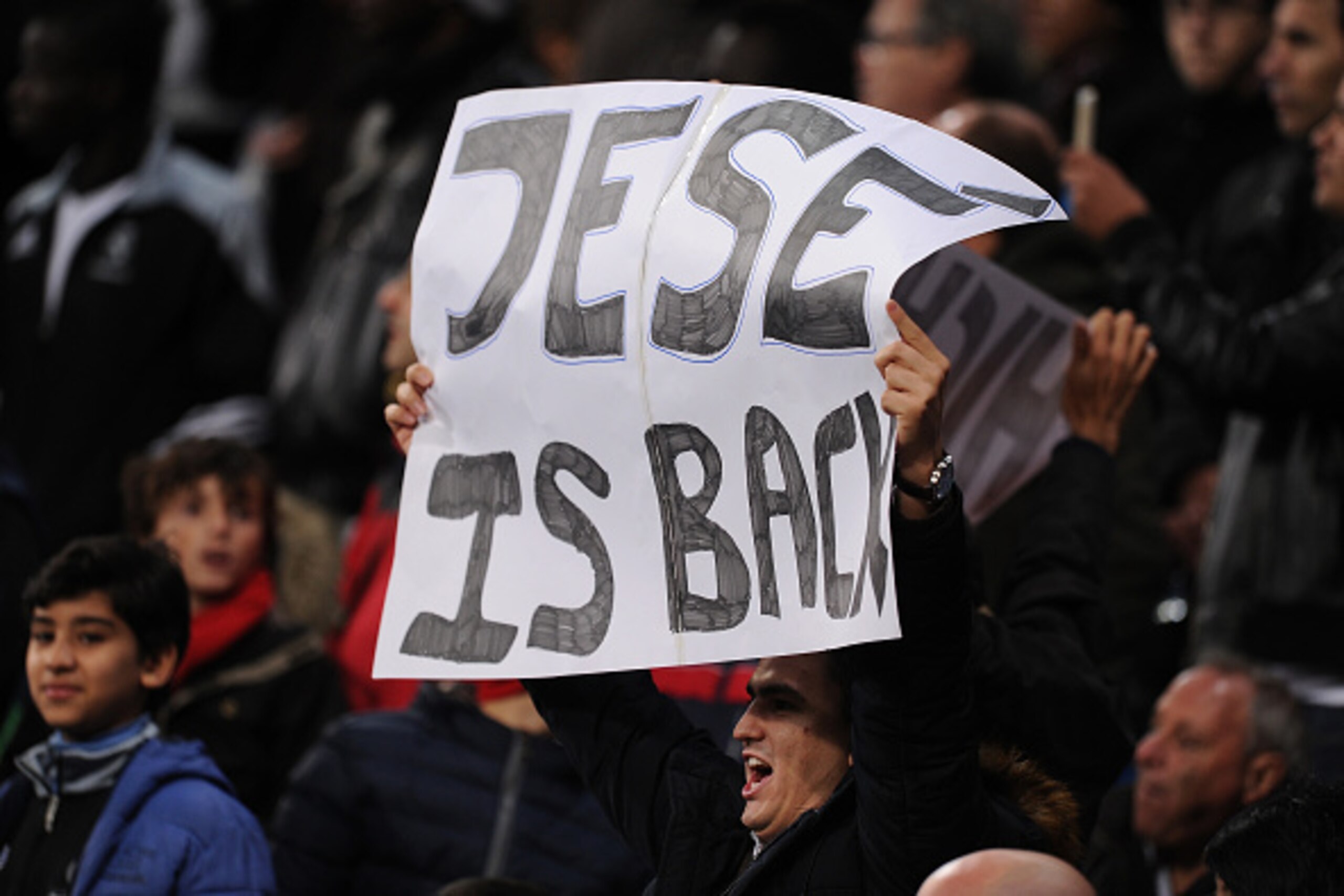MADRID, SPAIN - DECEMBER 02:  A Real fan hold up a sign while Jese Rodriguez of Real Madrid comes on as a substitute after a long injury during the Copa Del Rey Round of 32, Second Leg match between Real Madrid CF and Cornella at Santiago Bernabeu stadium